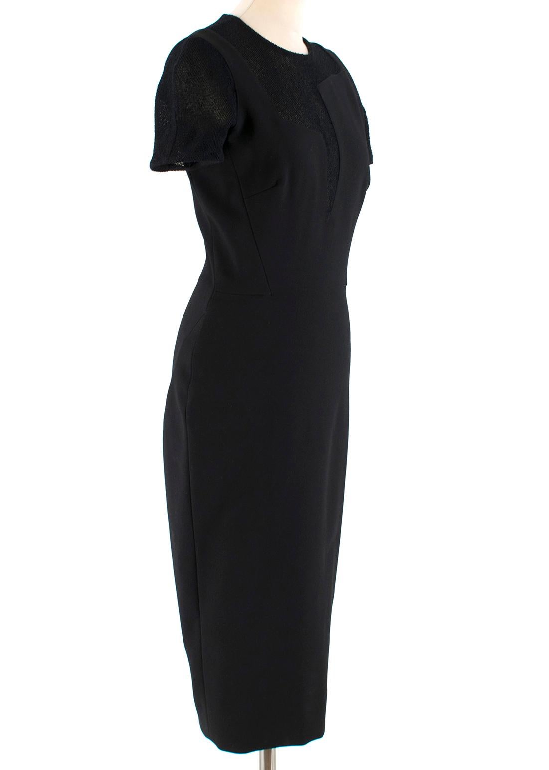Victoria Beckham Black Sheer Panelled Fitted Midi Dress

- 100% Cotton black dress with transparent details on the neck and sleeves  
- Short sleeves, scoop neck 
- Slim fit 
- Zip fastening on the back 

Please note, these items are pre-owned and