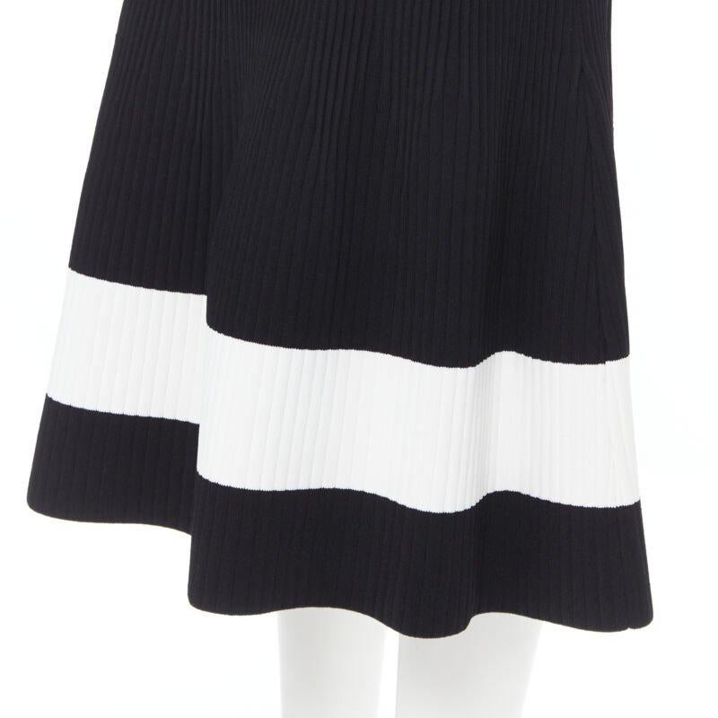 VICTORIA BECKHAM black white colorblocked ribbed fit flare midi skirt XS
Reference: LNKO/A01759
Brand: Victoria Beckham
Designer: Victoria Beckham
Material: Viscose, Blend
Color: Black, White
Pattern: Solid
Closure: Zip
Extra Details: Ribbed knit.