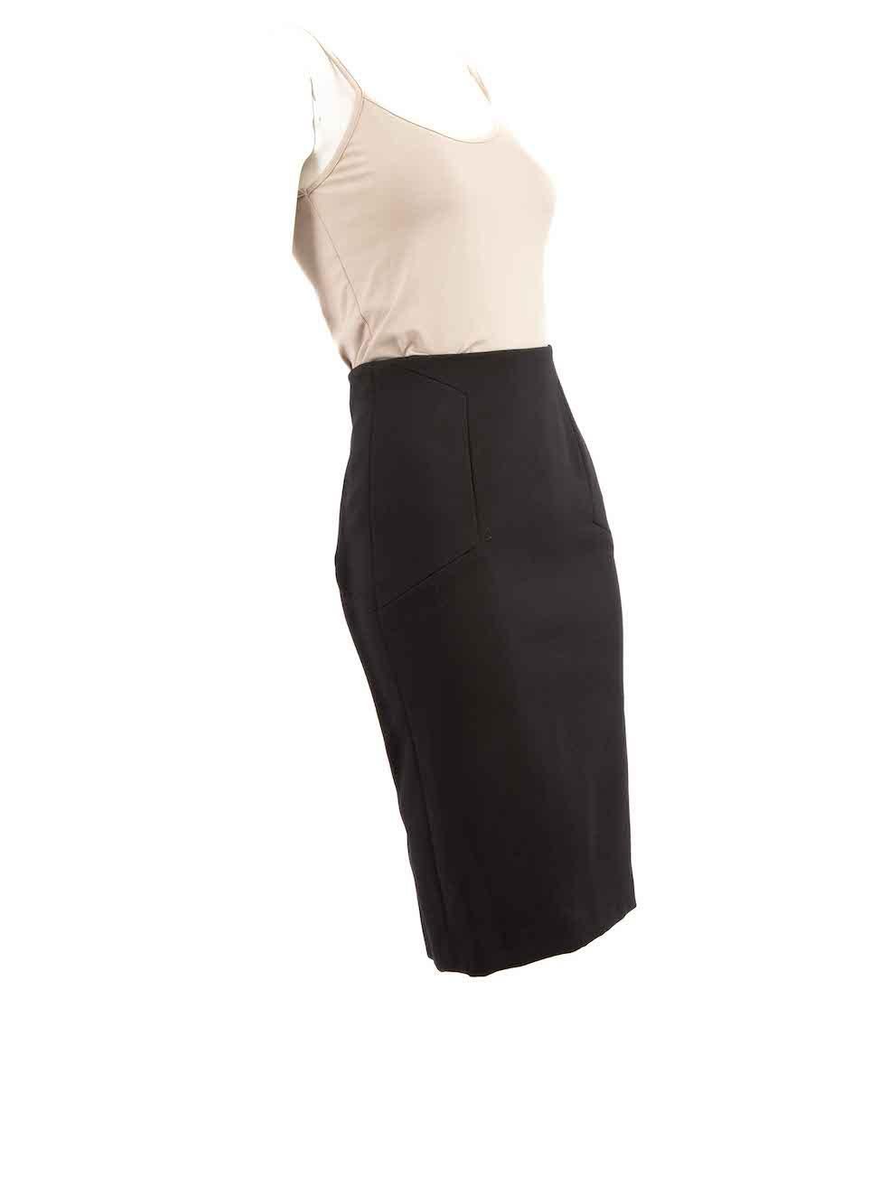 CONDITION is Very good. Minimal wear to skirt is evident. Minimal discolouration to inside hem on this used Victoria Beckham designer resale item.
 
 Details
 Black
 Wool
 Pencil skirt
 Midi
 Back open ended zip fastening
 Figure hugging fit
 
 
