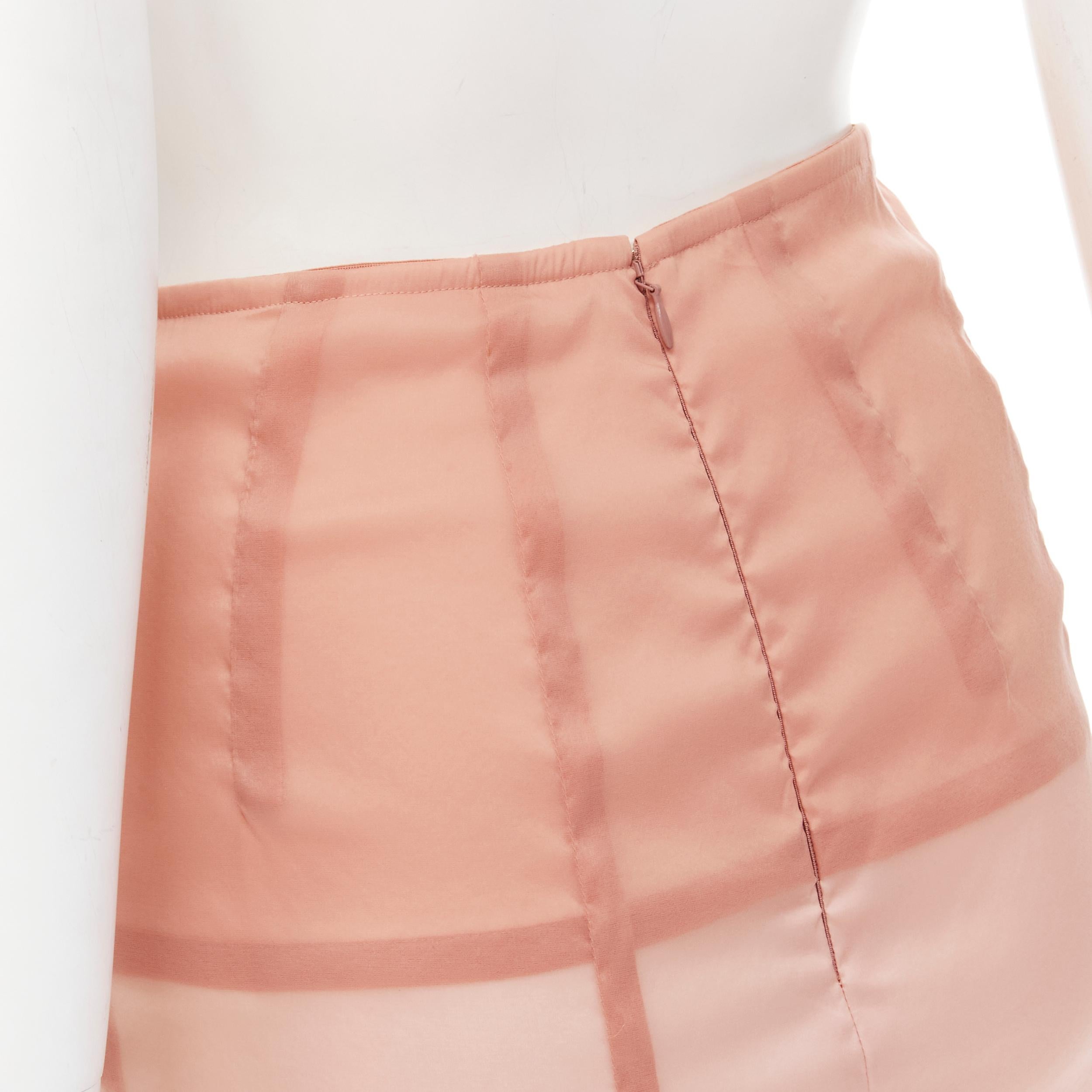 VICTORIA BECKHAM blush exposed seams semi sheer layered pencil skirt UK6 XS 
Reference: LNKO/A02016 
Brand: Victoria Beckham 
Material: Silk 
Color: Pink 
Pattern: Solid 
Closure: Zip 
Extra Detail: Exposed seams. Semi sheer beige outer fully lined