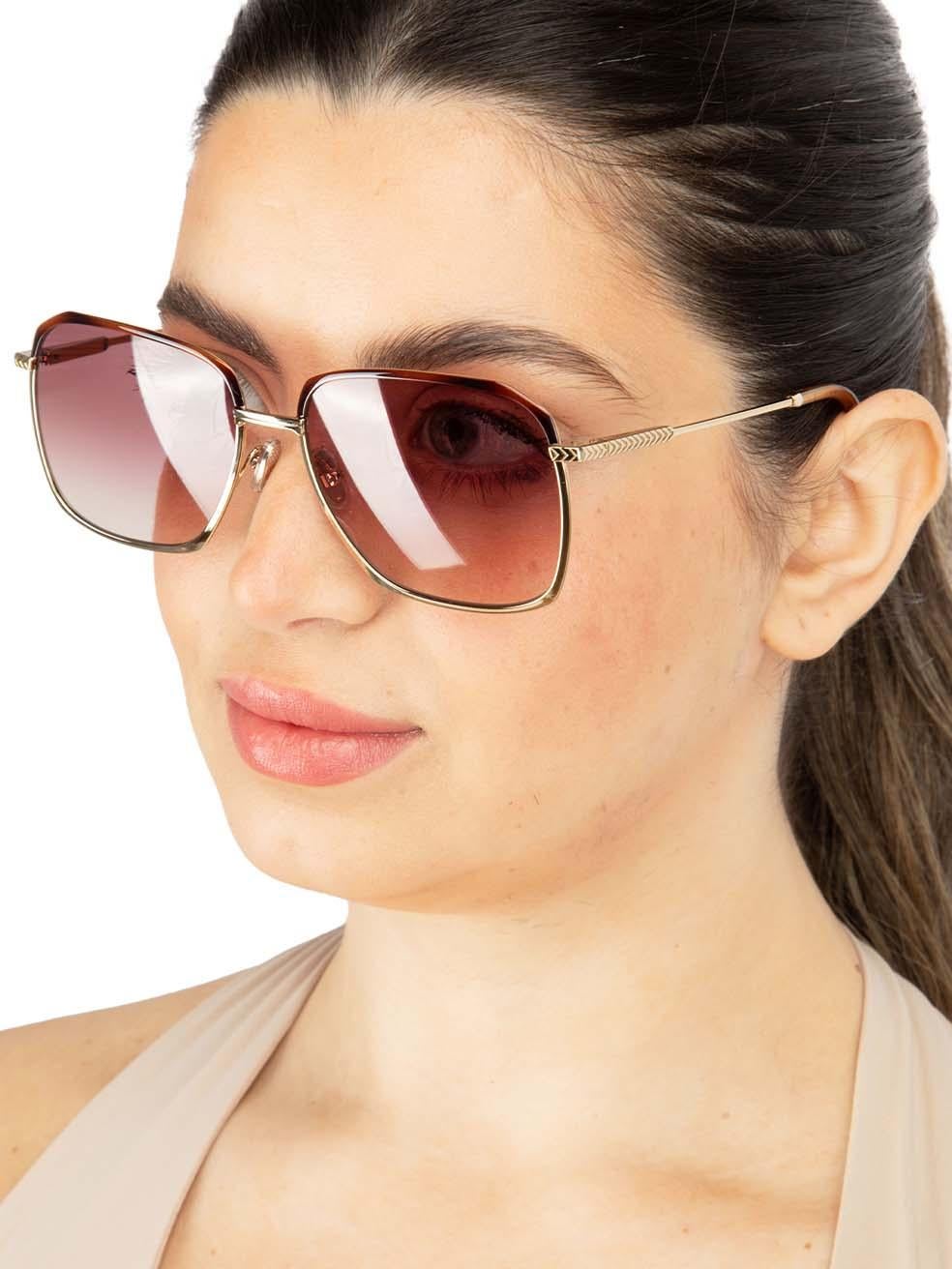 CONDITION is New with tags on this brand new Victoria Beckhamdesigner item. This item comes with original packaging.
 
 
 
 Details
 
 
 Model: VB207S 712 59
 
 Burgundy and gold
 
 Metal
 
 Square Eye Sunglasses
 
 Gold Metal Frame and Arms
 

