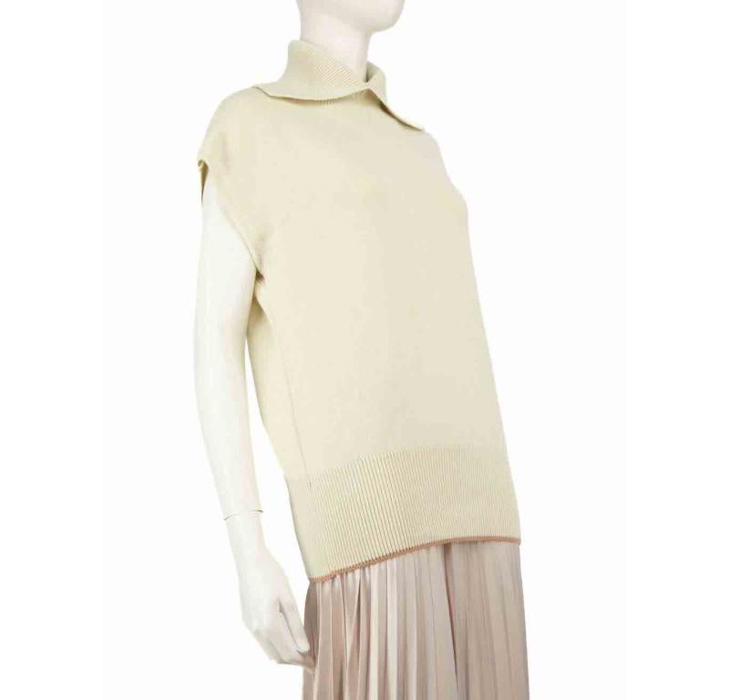 CONDITION is Very good. Hardly any visible wear to the knitwear is evident on this used Victoria Beckham designer resale item.
 
 
 
 Details
 
 
 Ecru
 
 Cashmere
 
 Knit top
 
 Logo embroidered neck detail
 
 Sleeveless
 
 Turtleneck
 
 
 
 
 
