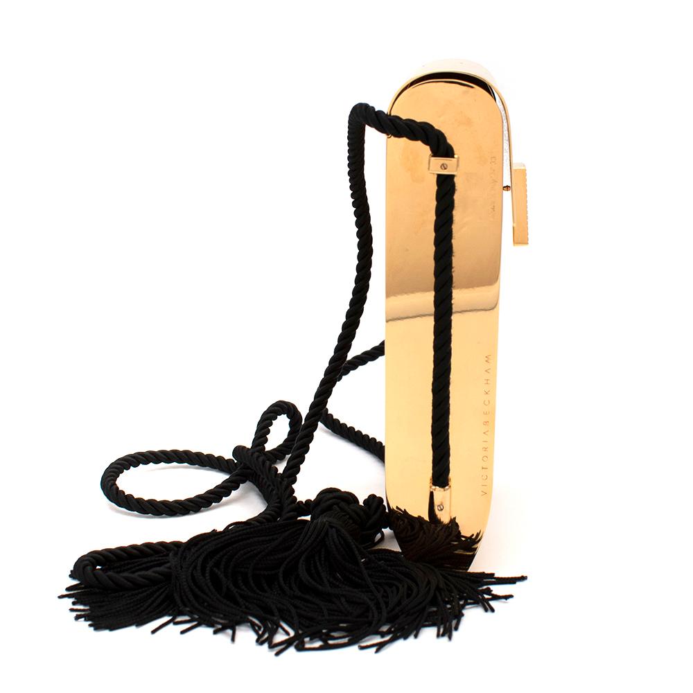 Victoria Beckham Brass Gold Box Minaudiere With Rope Chain

- Textured Outer 
- Tassels detail 
- Clip closure 
- Mid-weight
- Dust bag included
- Internal slip pocket 
- Interior Embossed branding 
- Braided Robe Strap 

Made in Italy

Fabric