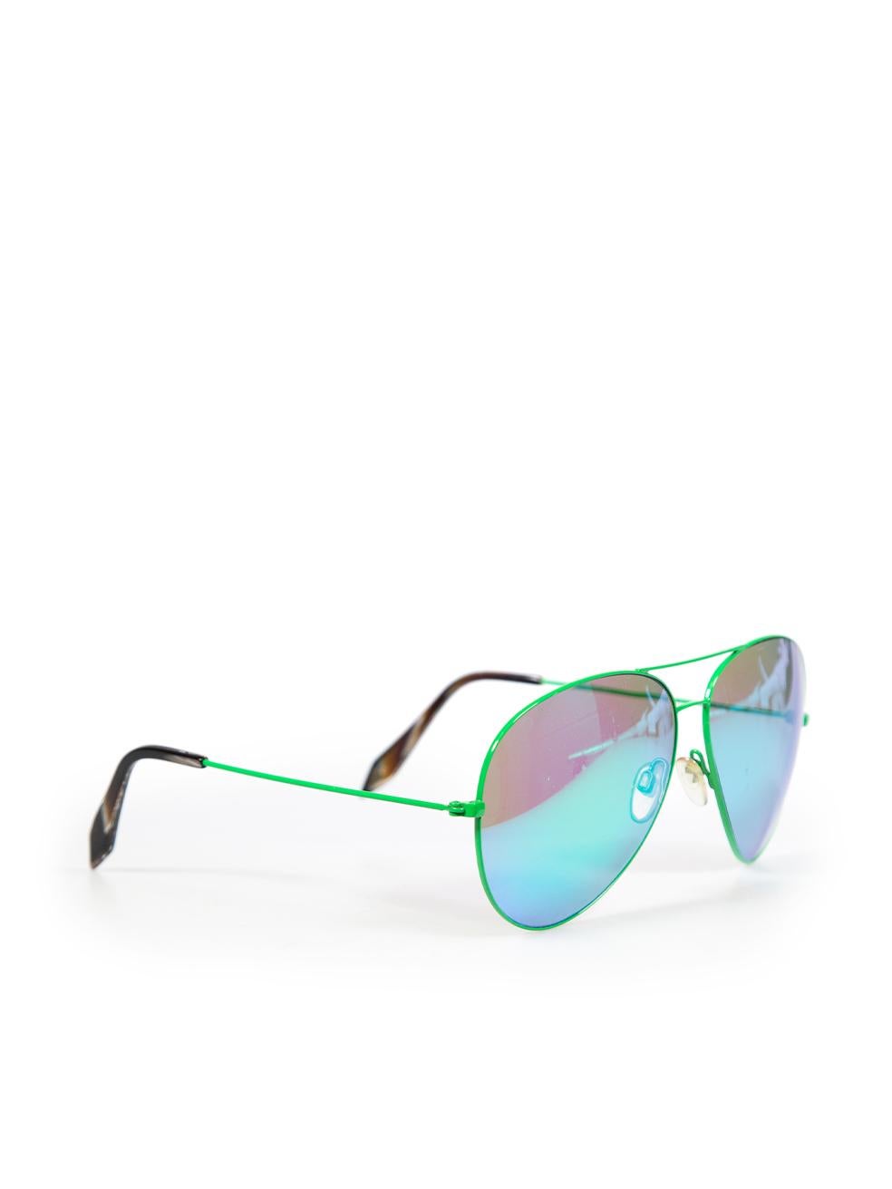 CONDITION is Very good. Minimal wear to the sunglasses is evident. Light scratches to both lenses this used Victoria Beckham designer resale item. These sunglasses come with the original case and lens cleaner.
  
  Details
  
  
  Green 
  
  Metal
