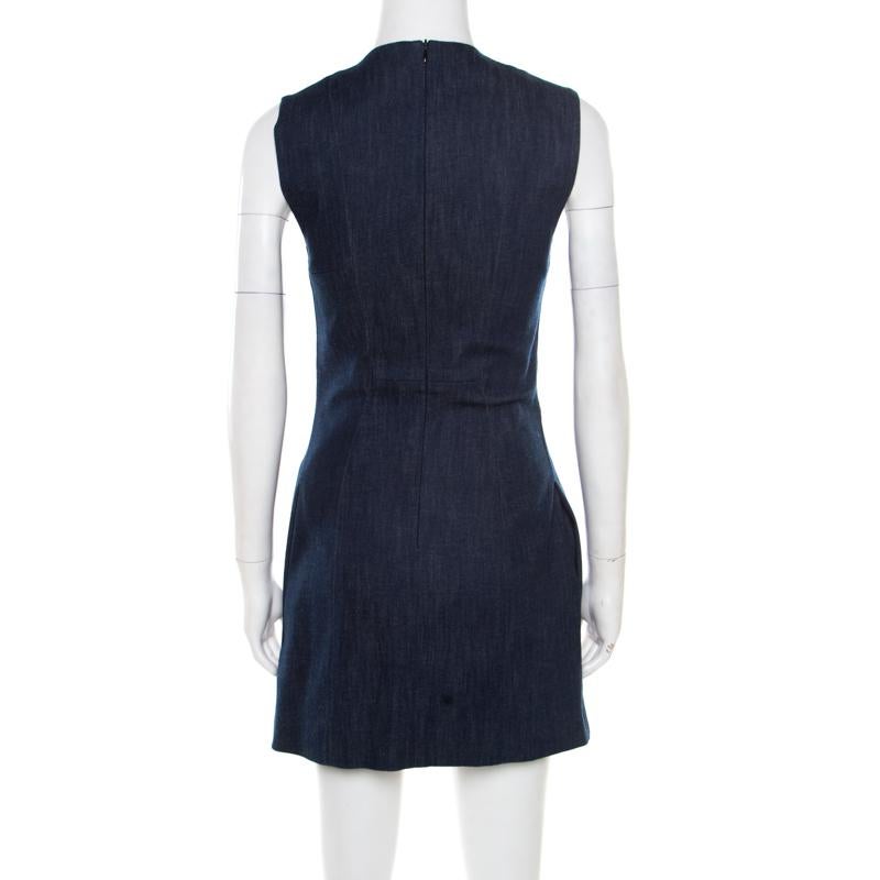 Opt for this piece from Victoria Beckham as it is beautifully made and simply pleasing to the eyes. Tailored from denim, the dress has a sleeveless design, box pleat detail and a back zipper. It will work well with sneakers and heels as