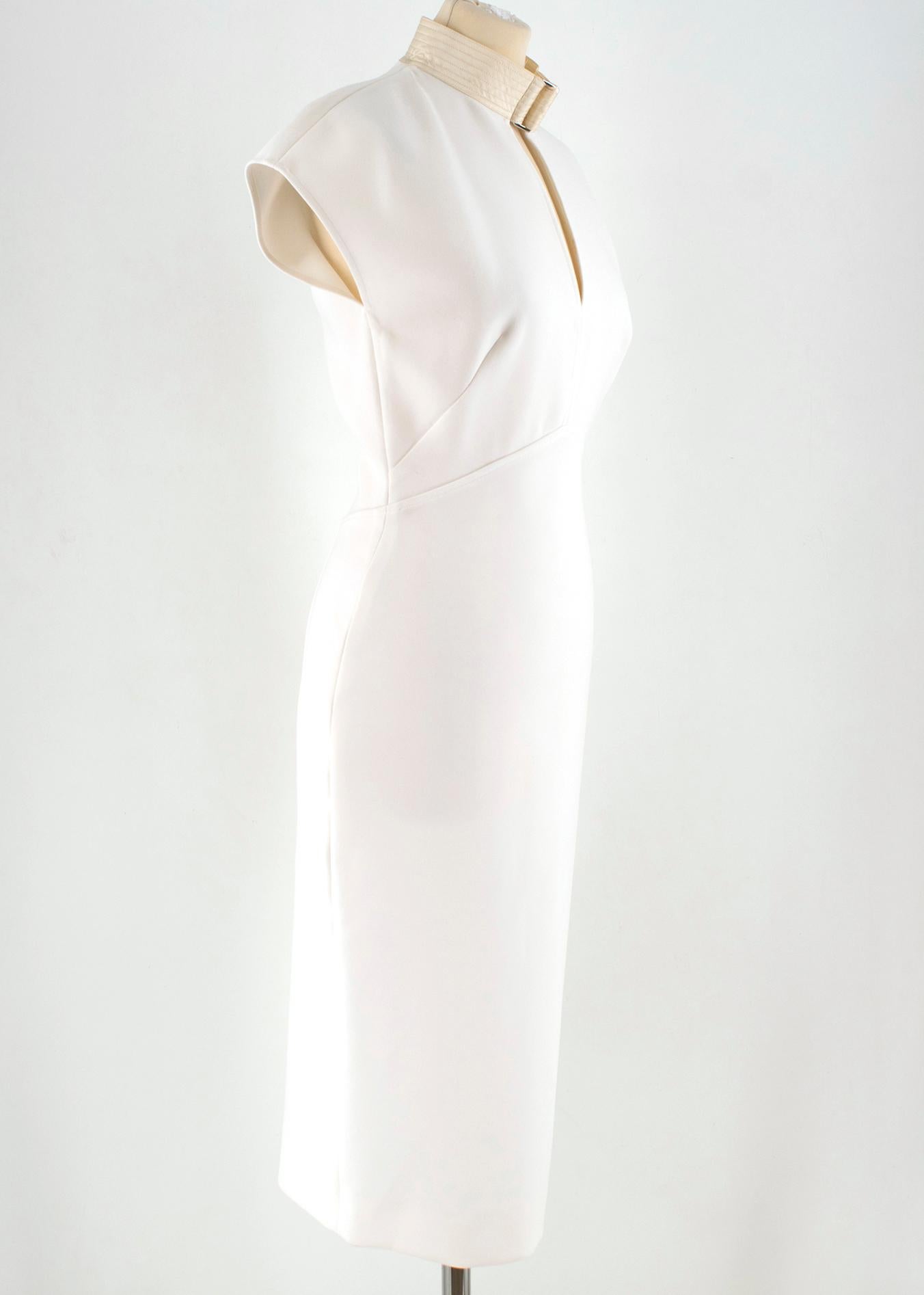 Victoria Beckham Ivory silk fitted high neck midi dress

- white midi dress
- fitted fit
- contacting zip fastening to the back
- silk collar
- unlined

Please note, these items are pre-owned and may show some signs of storage, even when unworn and
