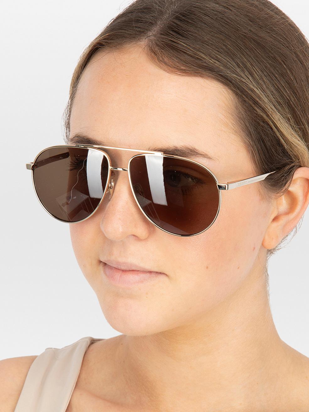 CONDITION is New with tags. No visible wear to sunglasses is evident on this new Victoria Beckham designer resale item. This item comes with original packaging.
 

 
 Details
 
 
 Model: VB242S 700
 
 Khaki
 
 Metal
 
 Aviator sunglasses
 
 Khaki