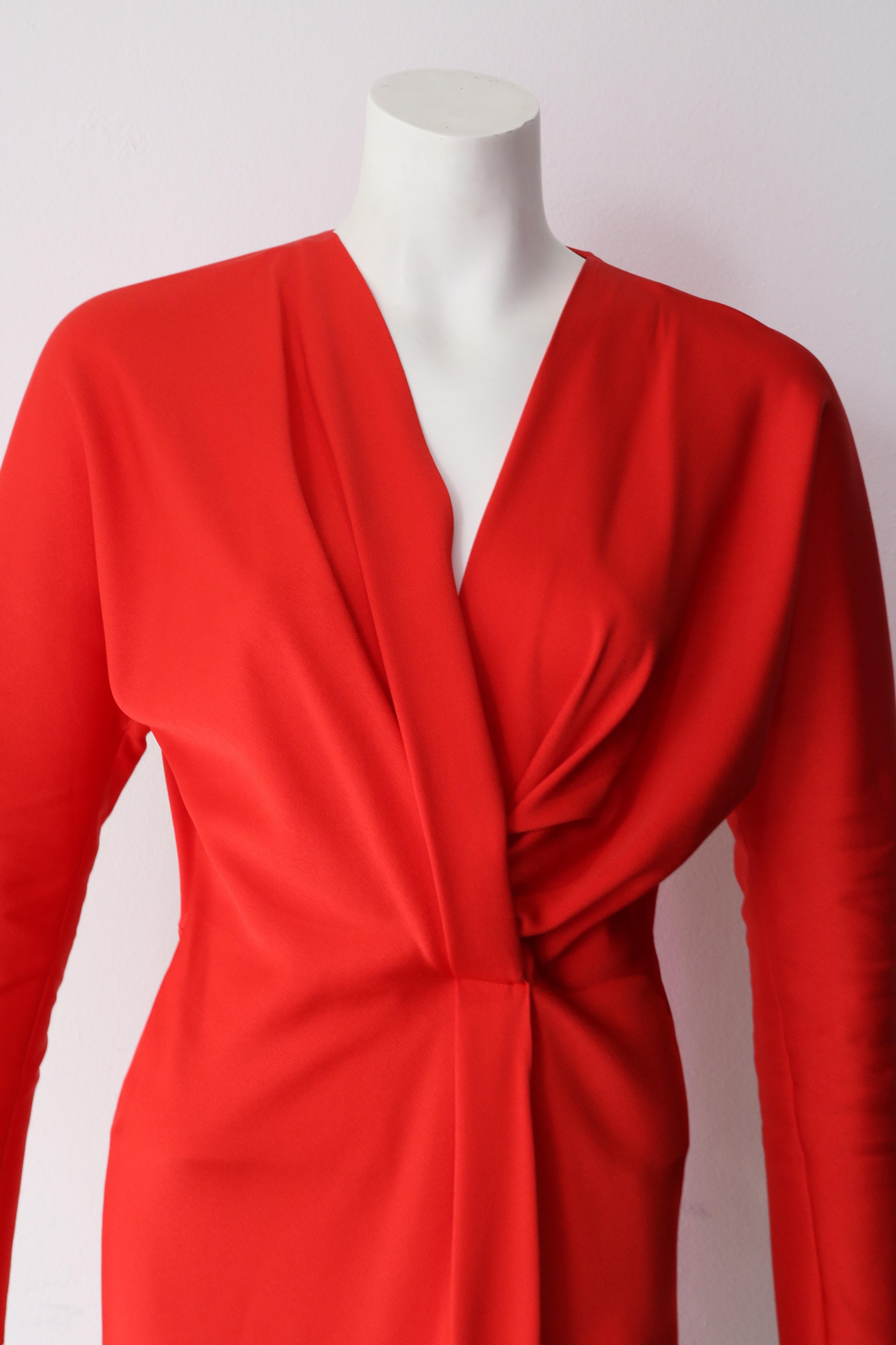 Victoria Beckham Red Cocktail Dress. 
V-neck, Midi length, 3/4 quarter arm. 
Never Been Worn Tags still on. 
Size 8 and 10 available (fits smaller) 
Original Price $2770 