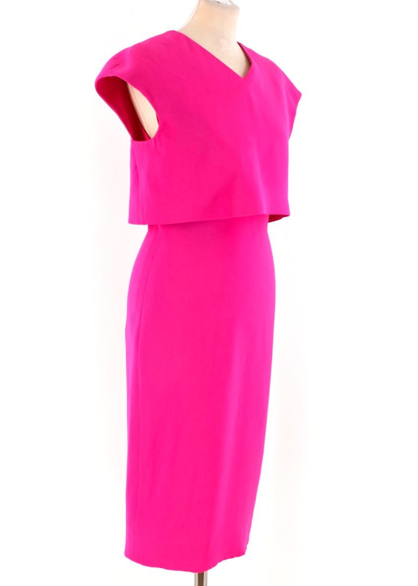 Victoria Beckham Magenta Double-Crepe Dress

- Magenta-pink, double crepe
- V-neck, short sleeves 
- Top overlay feature
- Back zip fastening
- 100% Polyester Lining: 100% Silk

Please note, these items are pre-owned and may show some signs of