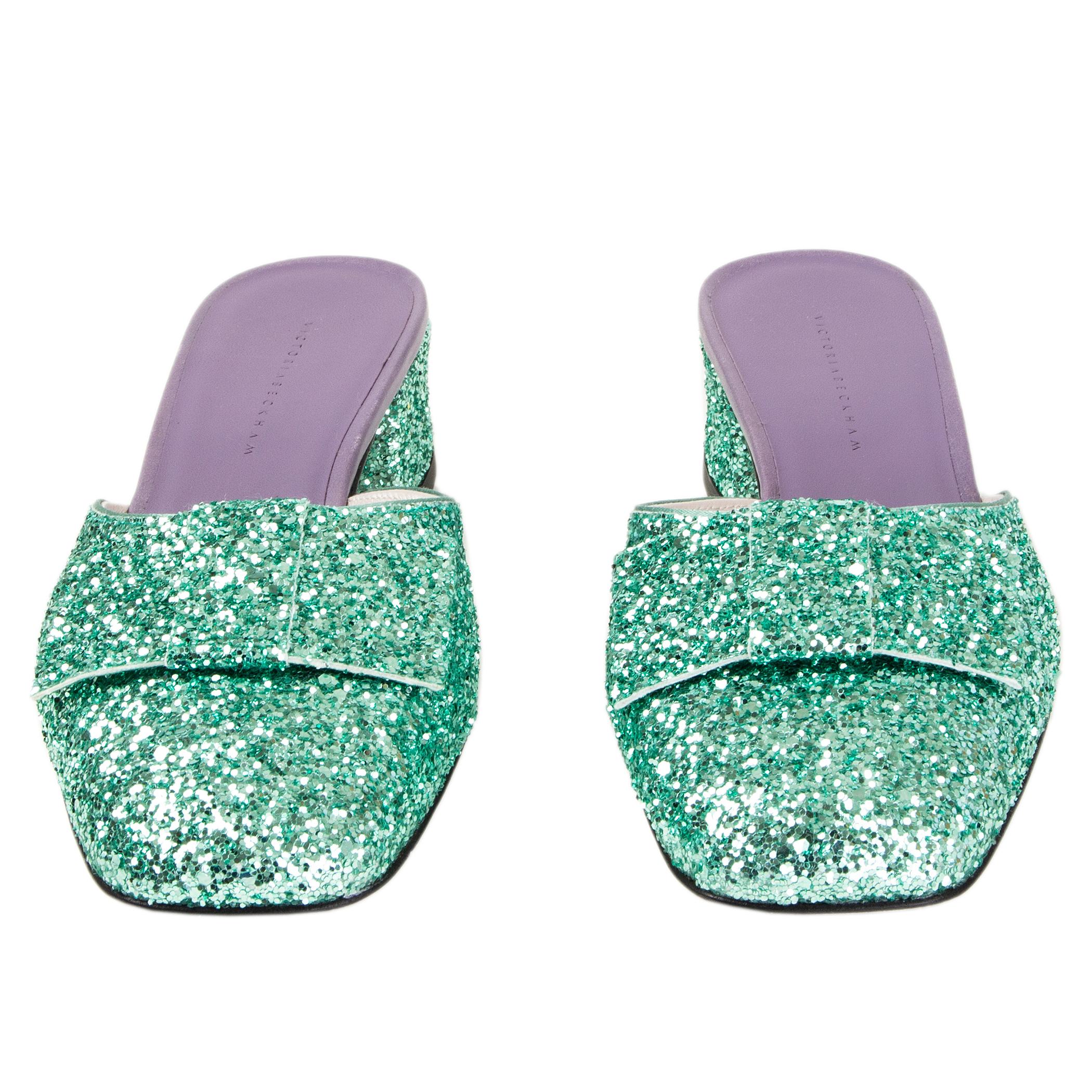 100% authentic Victoria Beckham 'Harper' mules in turquoise glitter and  lilac leather. Brand new. Come with dust bag.

Measurements
Imprinted Size	39.5
Shoe Size	39.5
Inside Sole	25.5cm (9.9in)
Width	8cm (3.1in)
Heel	4.5cm (1.8in)

All our listings