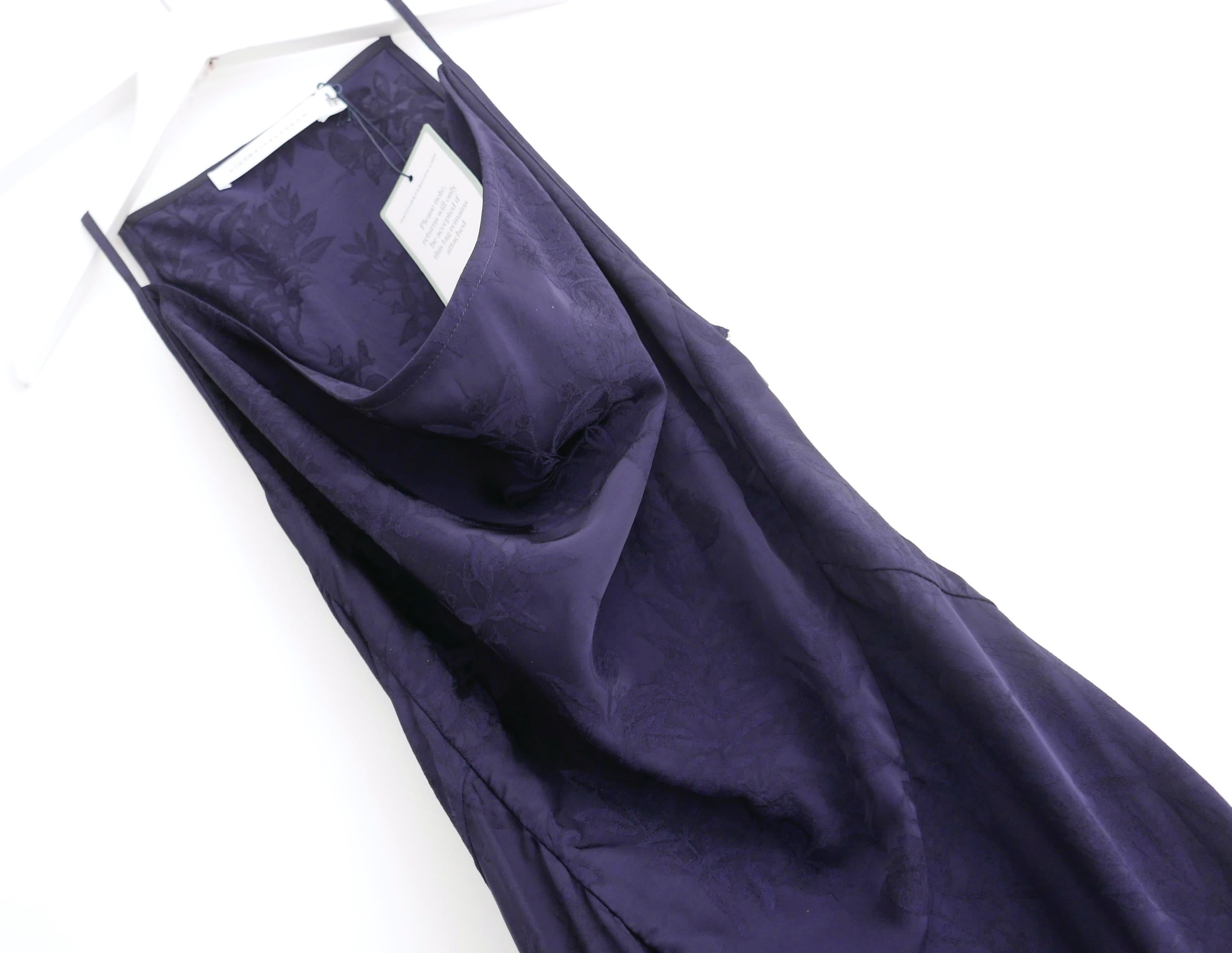 Slinky Victoria Beckham Myrtle Jacquard Drape Front Maxi Dress. Bought for £895 and new with Matches tag attached. Made from fluid navy jacquard viscose, it has a super flattering, panelled cut with 
with rounded bodice panelling, bias cut skirt