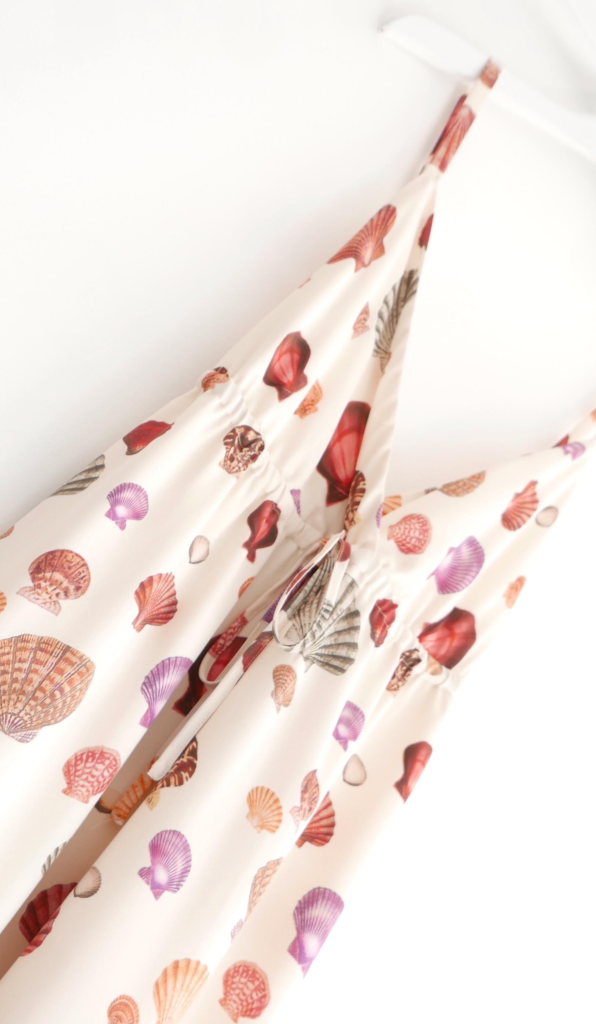 Stunning L’Agence Sachi shell print maxi dress. Bought for £450 and unworn. 
Made from cream fluid polyester crepe with a georgoues seashell print. It has a super flattering empire bust with below bust drawstring, flared maxi skirt and adjustable