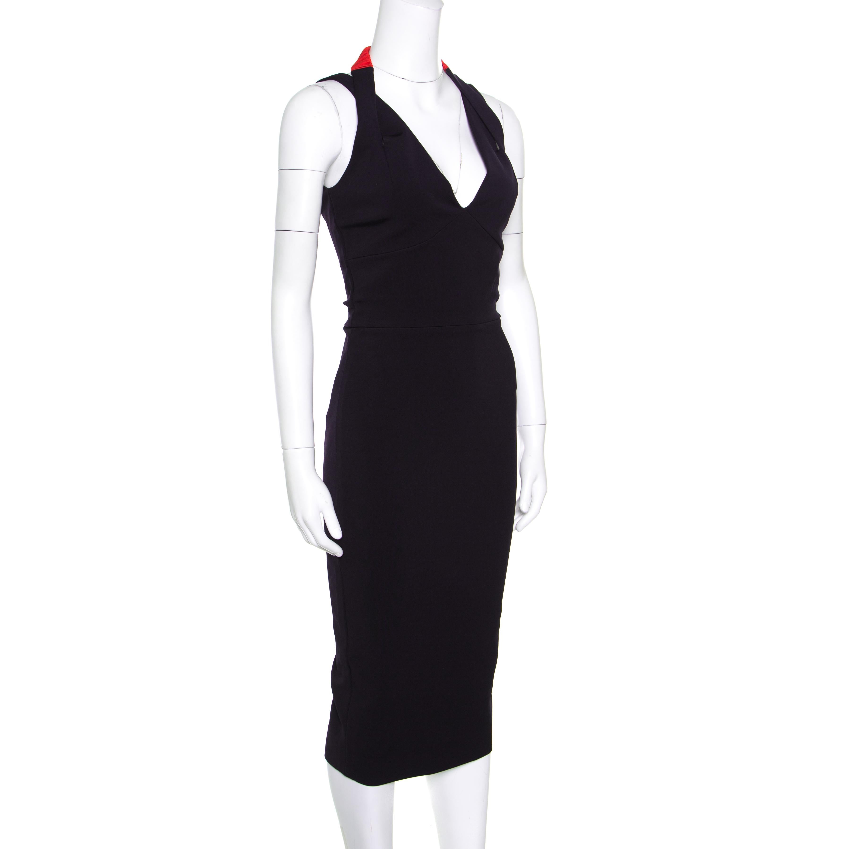 Victoria Beckham's designs are not only stylish but they're also worn by celebrities worldwide. This navy blue dress is posh and it is meant to perfectly complement a woman's body. It gives a fabulous fit and flaunts a plunging neckline, a contrast