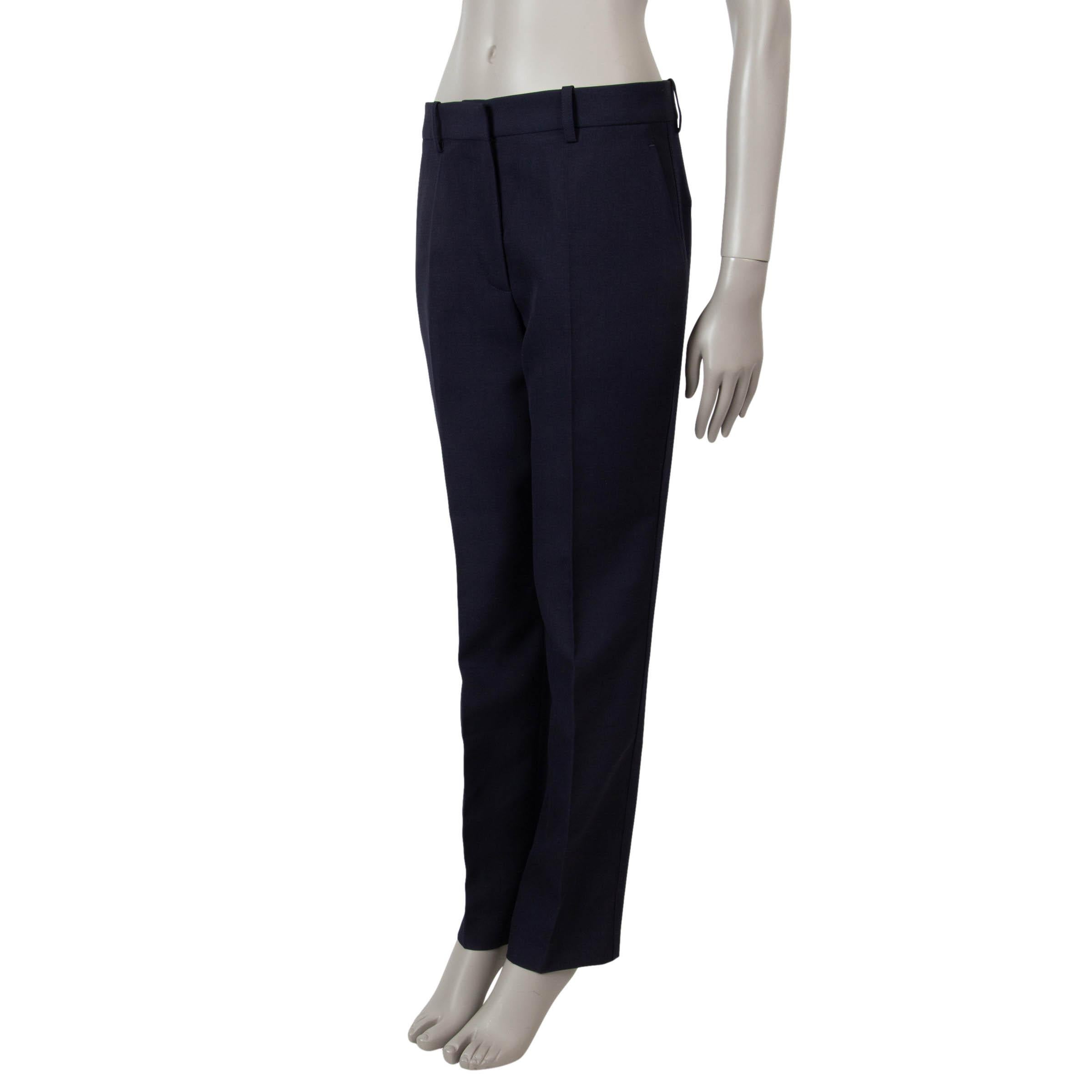These 100% authentic Victoria Beckham suit pants in twill wool (100%) are a timeless addition to your tailored wardrobe. Featuring tapered legs, belt loops, two slant pockets, and two back pockets, they combine elegance with functionality. The pants