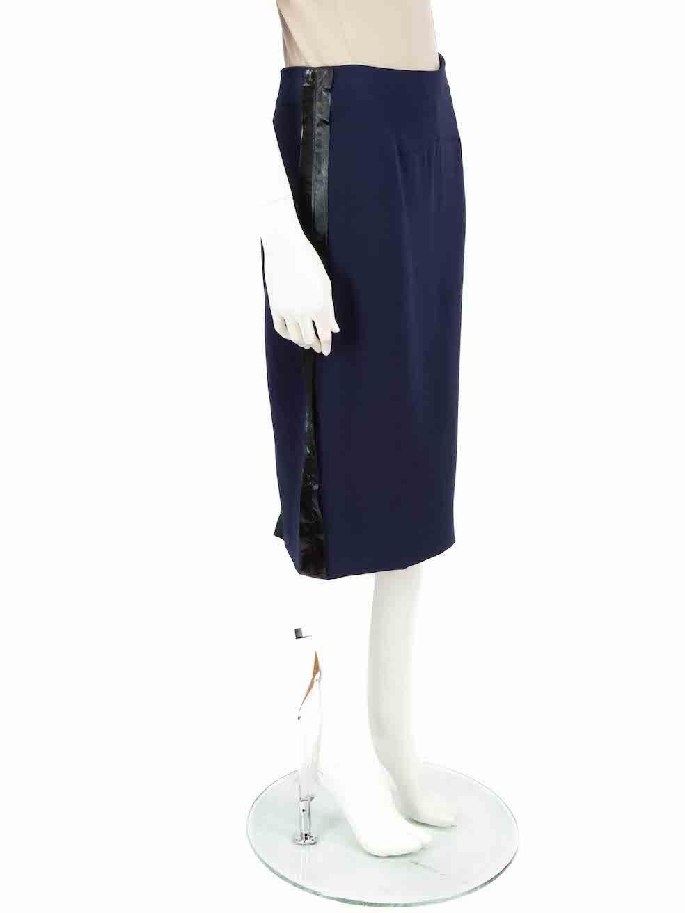 CONDITION is Very good. Minimal wear to skirt is evident. Minimal wear to the rear zip with tarnishing to the metal on this used Victoria Beckham designer resale item.
 
 
 
 Details
 
 
 Model: No.012
 
 Navy
 
 Silk
 
 Pencil skirt
 
 Knee length
