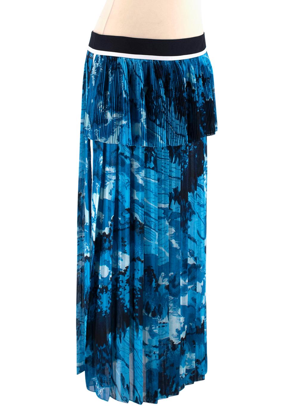 Victoria Beckham Blue and Black Pattern Skirt

- Printed
- Satin-crepe
- Chiffon
- Panelled
- Pleated
- Layered
- Concealed hook and zip fastening at side
- Side slit
- Non-stretchy, lightweight fabric
 
Materials:
- 100% Polyester

Dry Clean only