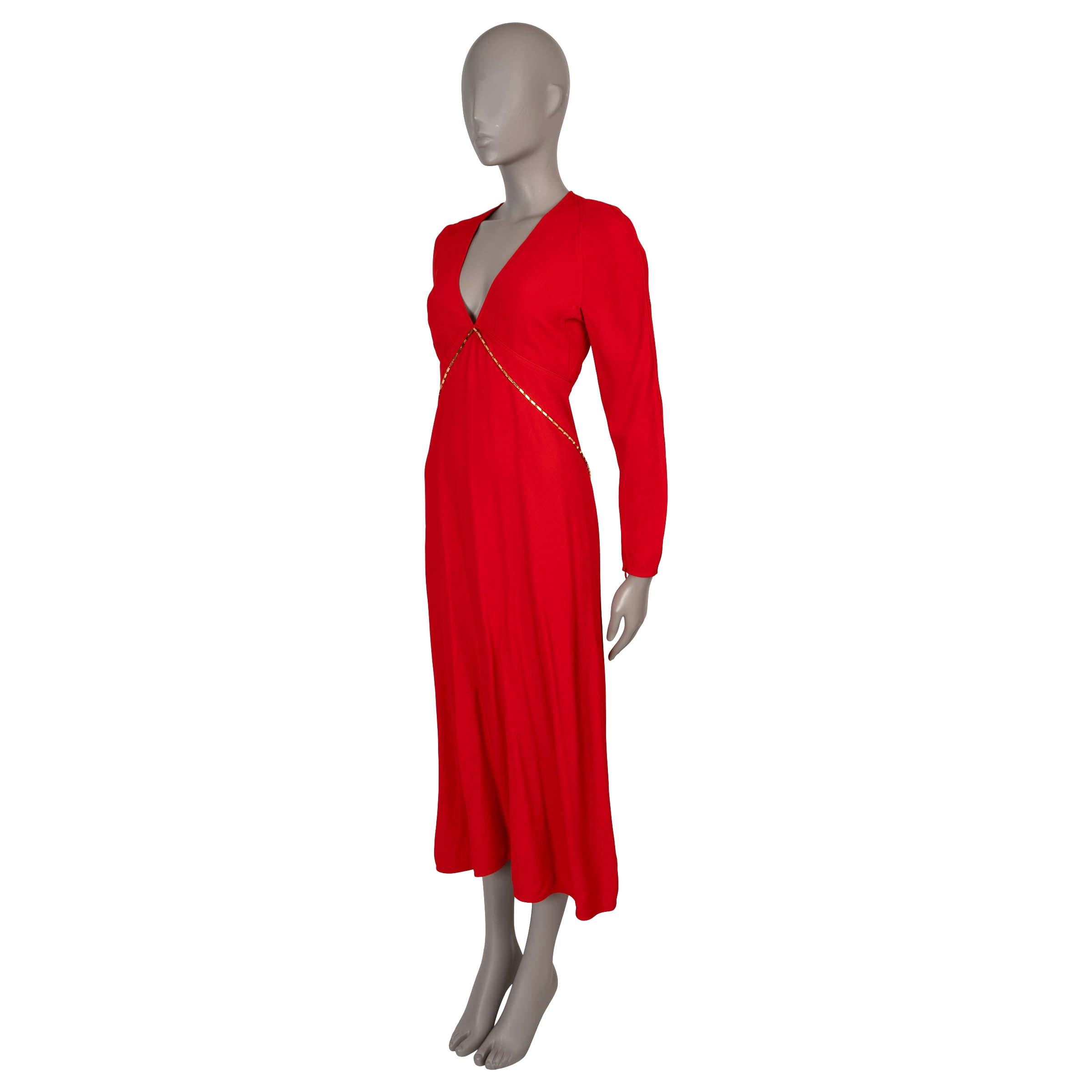 This 100% authentic Victoria Beckham dress in red crepe transitions effortlessly from office to dinner. Crafted from a blend of viscose (50%), acetate (42%), and elastane (8%), it features a relaxed, midi-length silhouette and is adorned with a