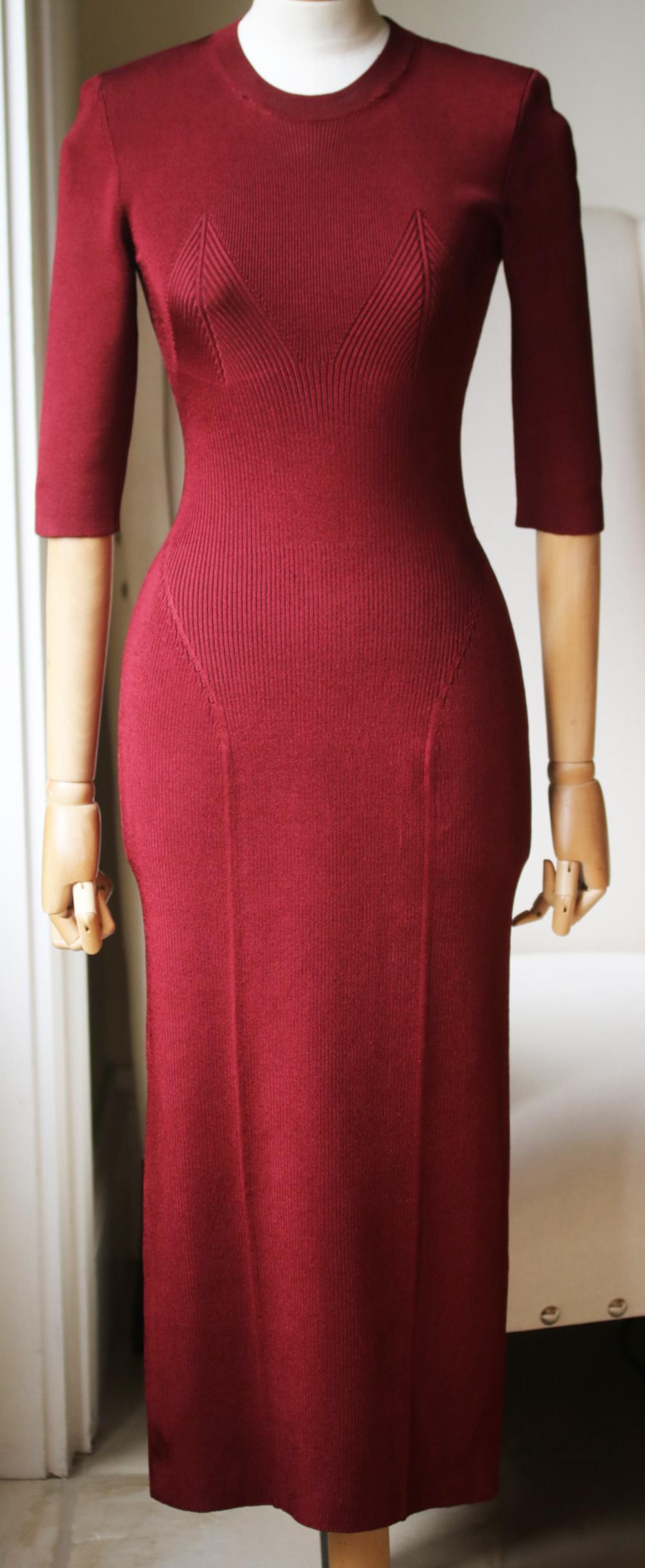 Made in Italy, this stretch-knit piece has a sculpting and smoothing effect, and is ribbed to subtly trace an hourglass silhouette. Burgundy-red stretch-knit. Slips on. 87% viscose, 11% polyamide, 2% elastane. Made in Italy. 

Size: 3 (UK 10/12, US