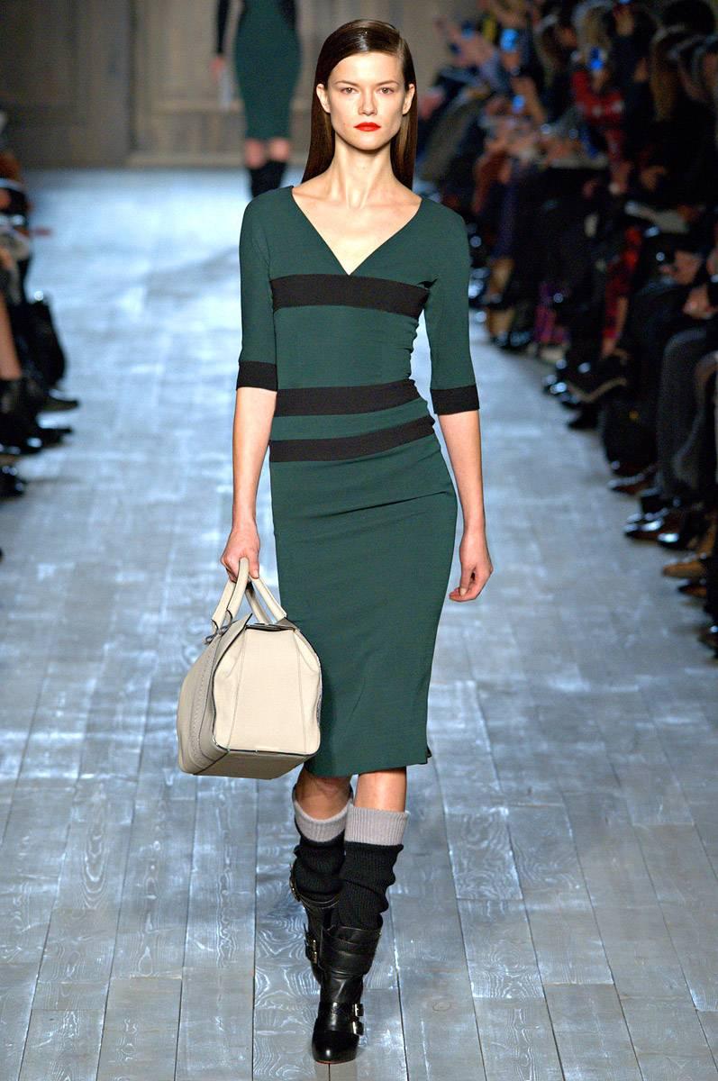 One of a kind olive green and black stripe Victoria Beckham dress from the 2012 runway collection. Features a V-neck and back zipper. Brand new.
 
Measurements
Tag size 2, fit like 0
Retails at: $2,500
 
Shoulder to Shoulder- 15 inches
Bust- 15