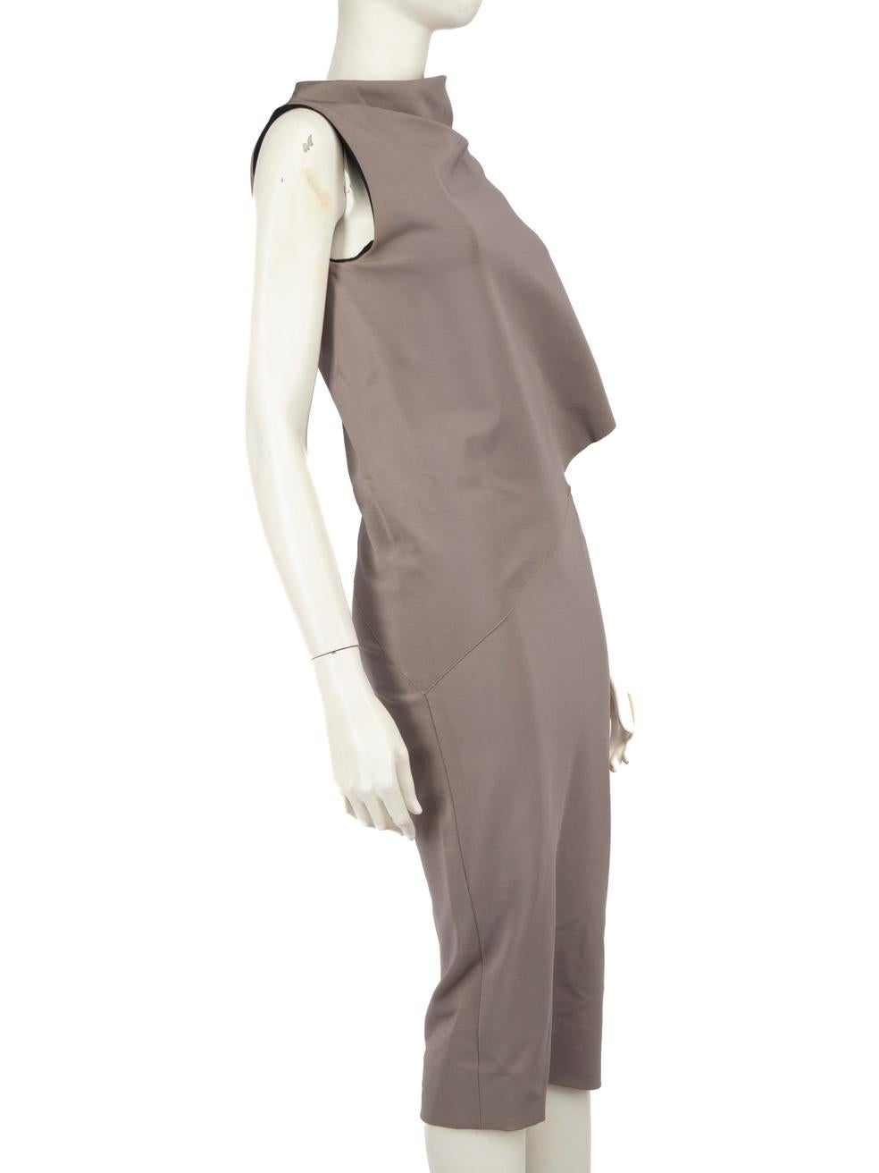 CONDITION is Very good. Minimal wear to the dress is evident. Tarnishing on the centre back zipper pull. Pluck to the stitching on the left sleeve drape. Pluck to the weave on the lower front. Discolouration on the right armpit, on the bust, centre