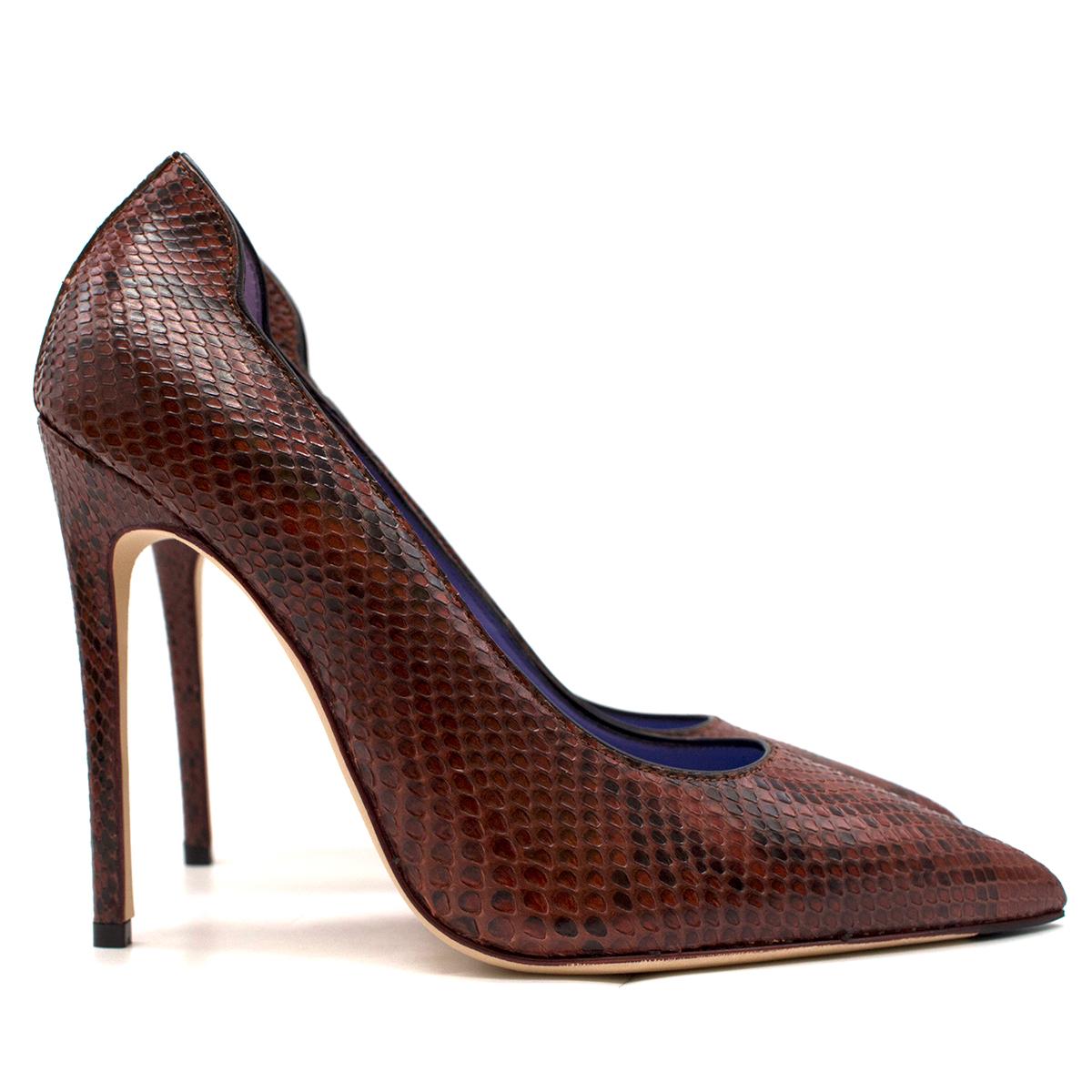 Victoria Beckham Burgundy Python Pumps

- One of a kind
- Burgundy python pumps
- Slip-on style
- Pointed toe
- 110cm stiletto heel
- Purple leather lining with logo embossed
- This item comes with the original dust bag and shoe box.

Please note,
