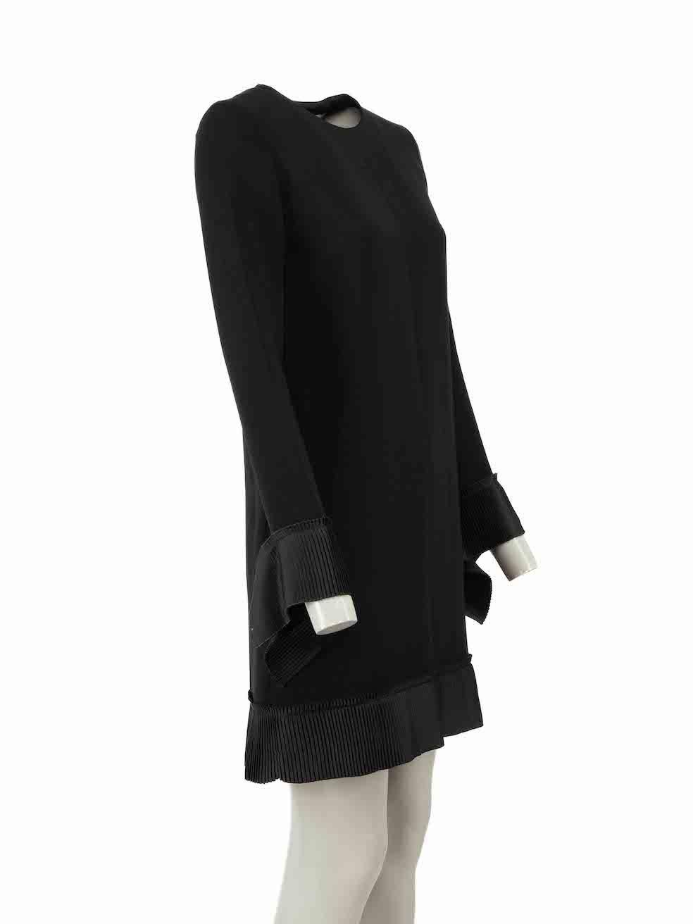 CONDITION is Very good. Minimal wear to dress is evident. Minimal wear to the underarm linings with light discolouration on this used Victoria Victoria Beckham designer resale item.
 
Details
Black
Polyester
Dress
Long sleeves
Mini
Round neck
Pleat