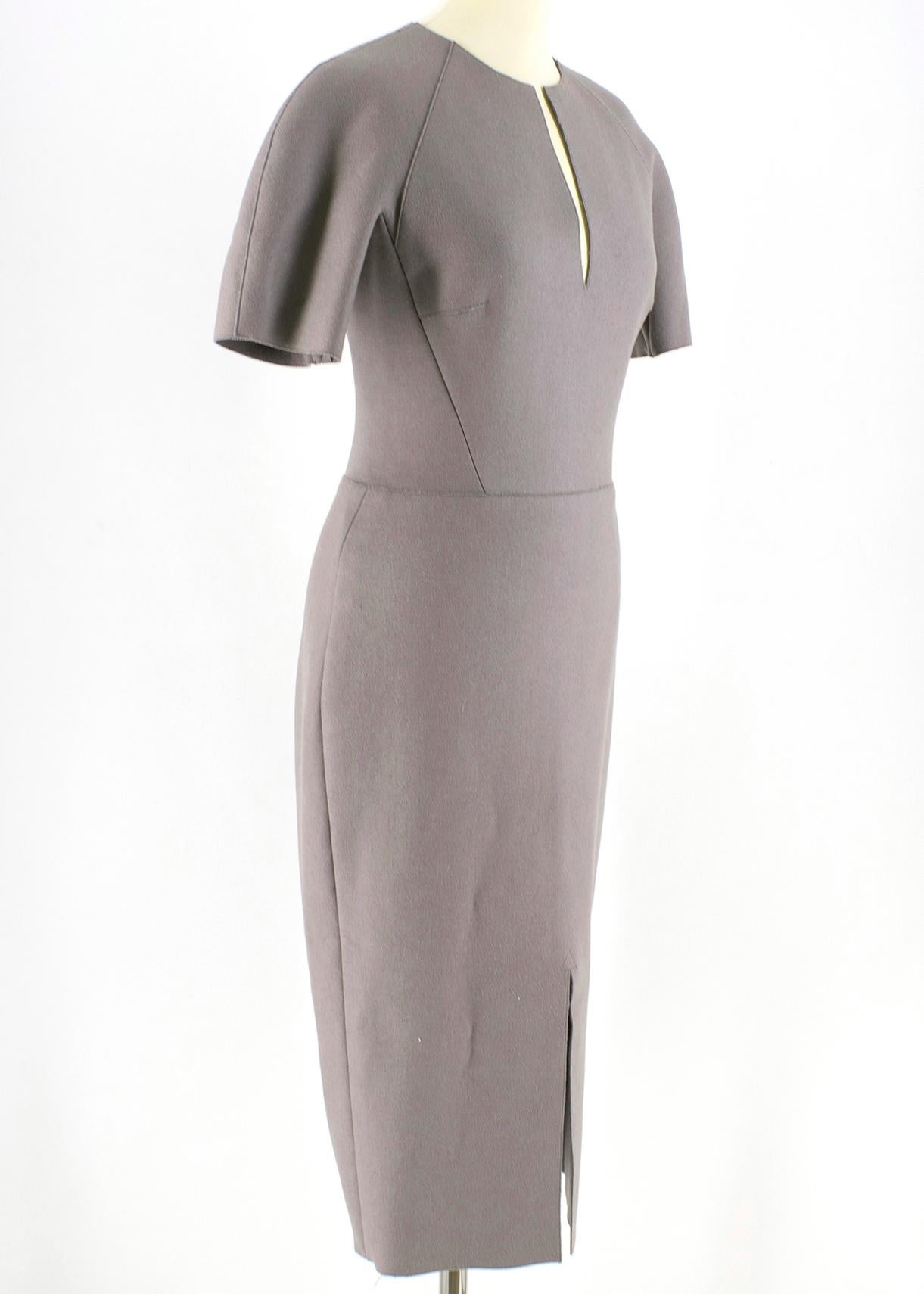 Victoria Beckham Wool Grey Shift Midi Dress

- grey midi dress
- shift bodycon silhouette
- raw trim 
- contrasting zip fastening to the back
- V neckline 
- Front cutout to the bottom 

Please note, these items are pre-owned and may show some signs