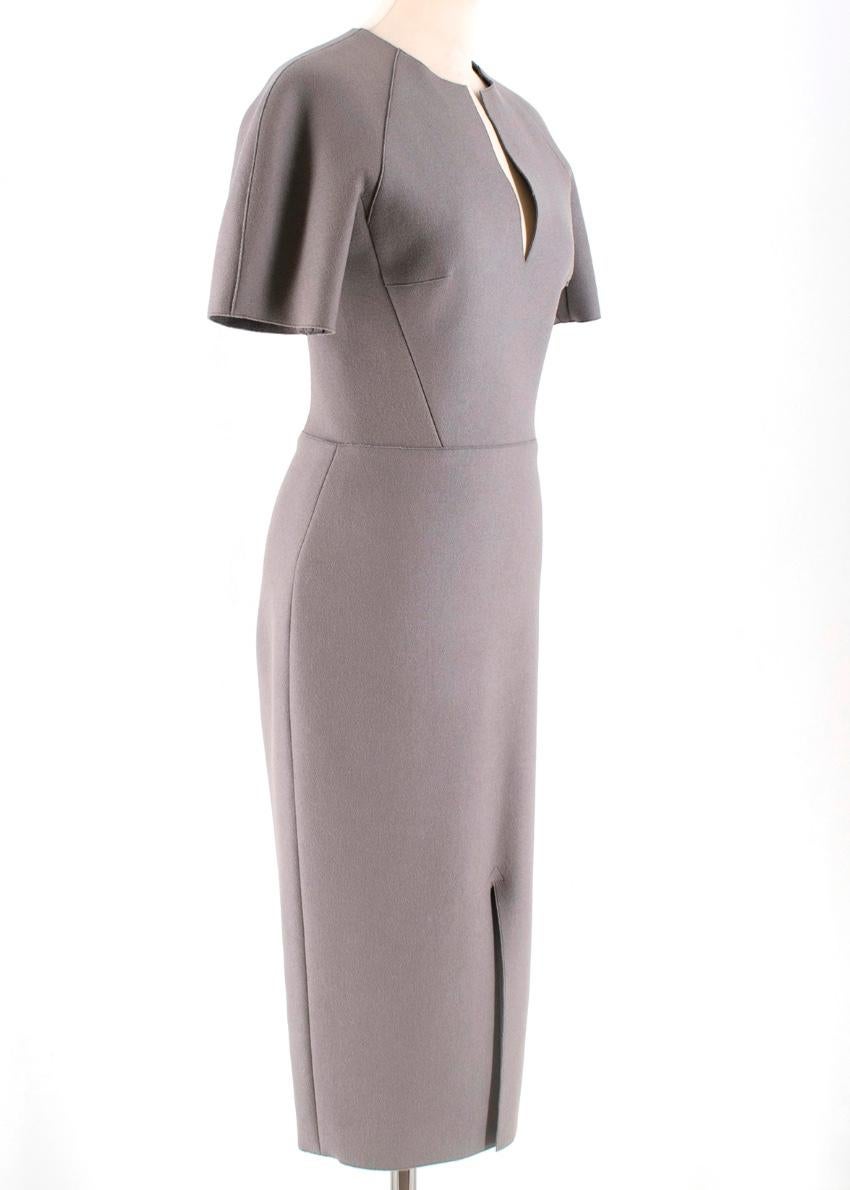 Victoria Beckham Wool Grey Shift Midi Dress

- Grey midi dress 
- Shift bodycon silhouette 
- Raw trim  
- Contrasting zip fastening to the back 
- V neckline  
- Front cutout to the bottom
- Front Slit 

95% Wool 
4% Nylon
1% Elastane 

Made in