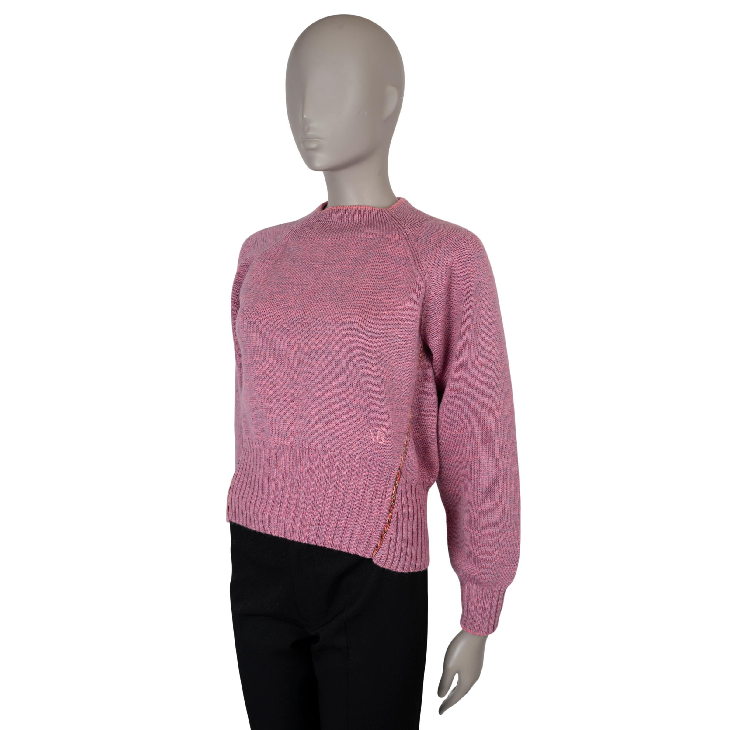 This Victoria Beckham x The Woolmark Company sweater in heather pink 100% Merino wool features red, yellow, and black braided seam detailing, wide rib-knit trims, and raglan sleeves (sleeve measurement taken from the neck). As part of Victoria