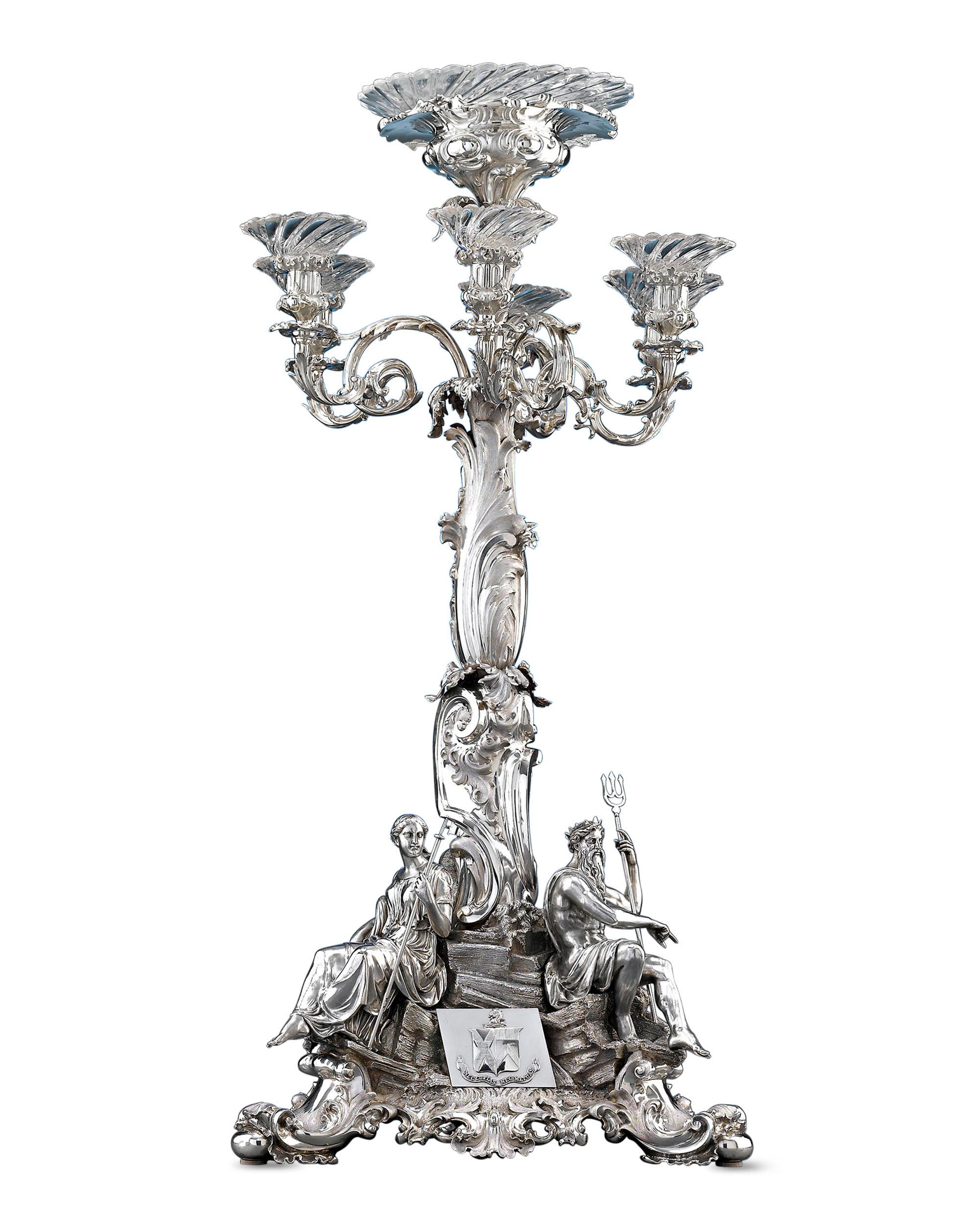 This breathtakingly grand and beautifully crafted sterling silver epergne centerpiece pays homage to the builder of Victoria Bridge in Glasgow, which was one of the two largest bridges in Britain at the time. Masterful skill and incredible precision