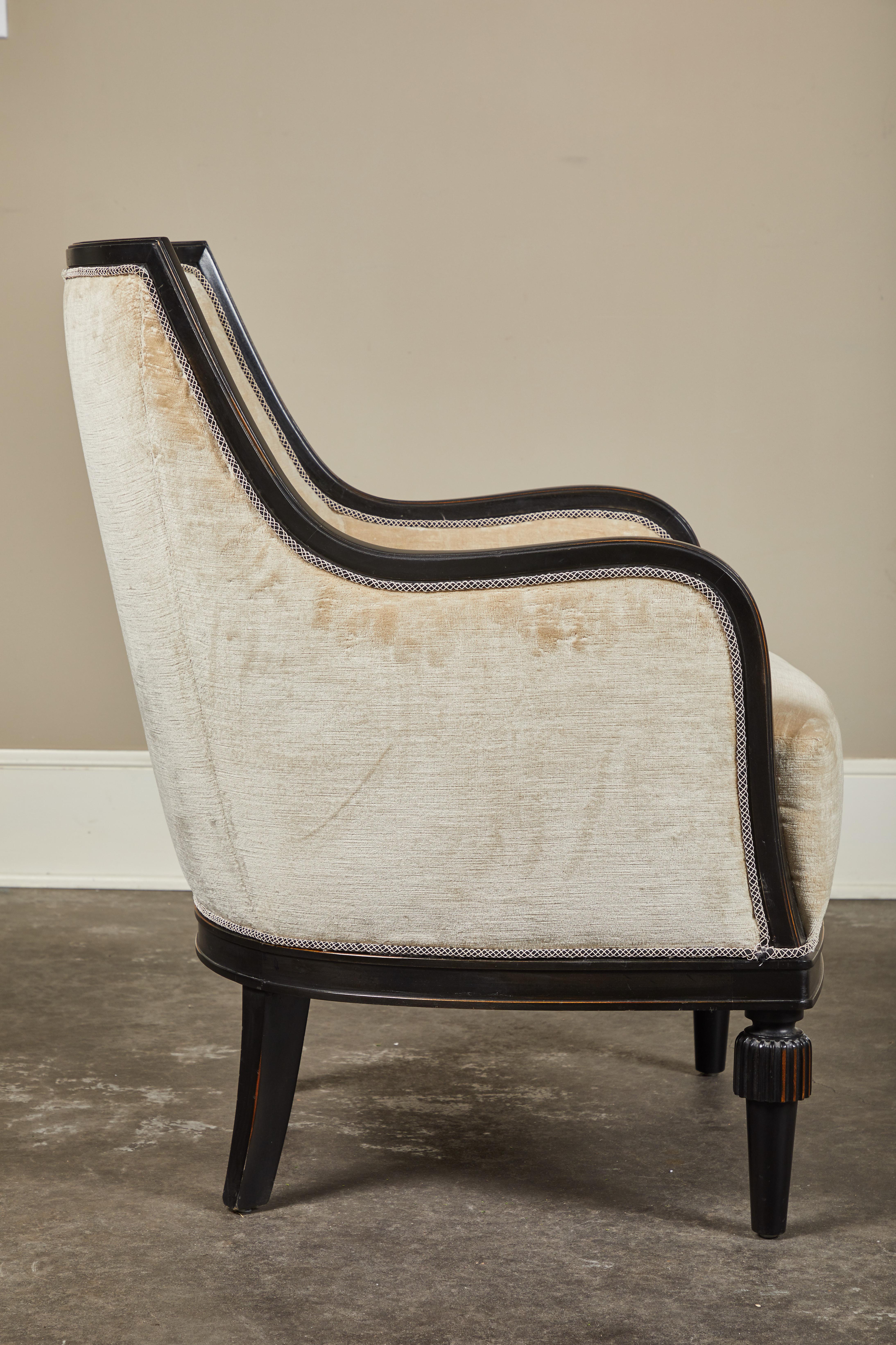 Our Victoria chair with tassel foot detailing in our ebonized finish with a light distress, inspired by an original Swedish 1930s Art Deco pair we found during our travels. Hardwood frame, 8 way hand-tied, COM, 8-10 week lead time.