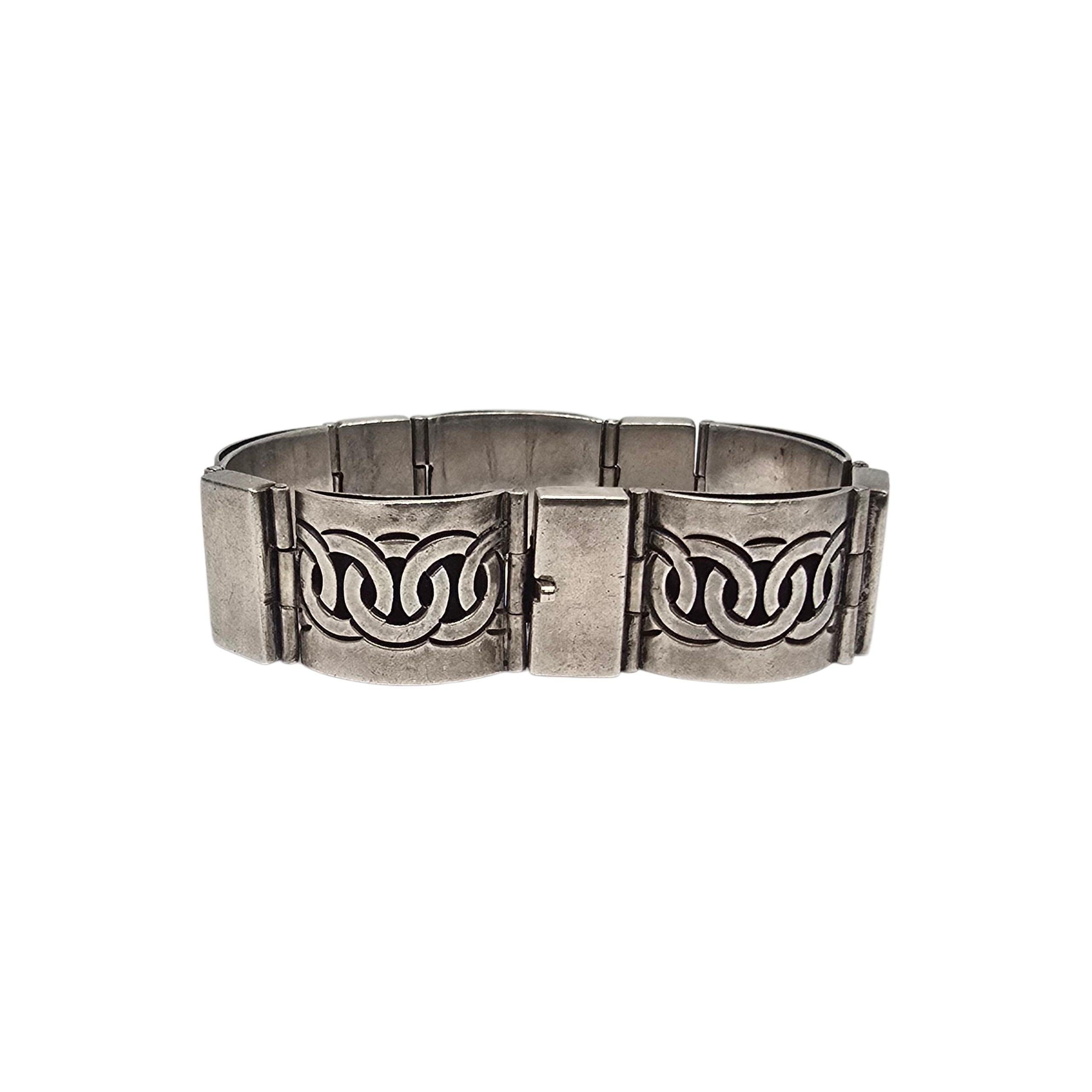 Victoria Mexico Sterling Silver Pattern 62 Panel Bracelet

Ana Nunez Brilanti, known as Victoria, established her workshop in 1940. This beautiful bracelet features a Mayan tribal design on every other panel, alternating w/smooth polished