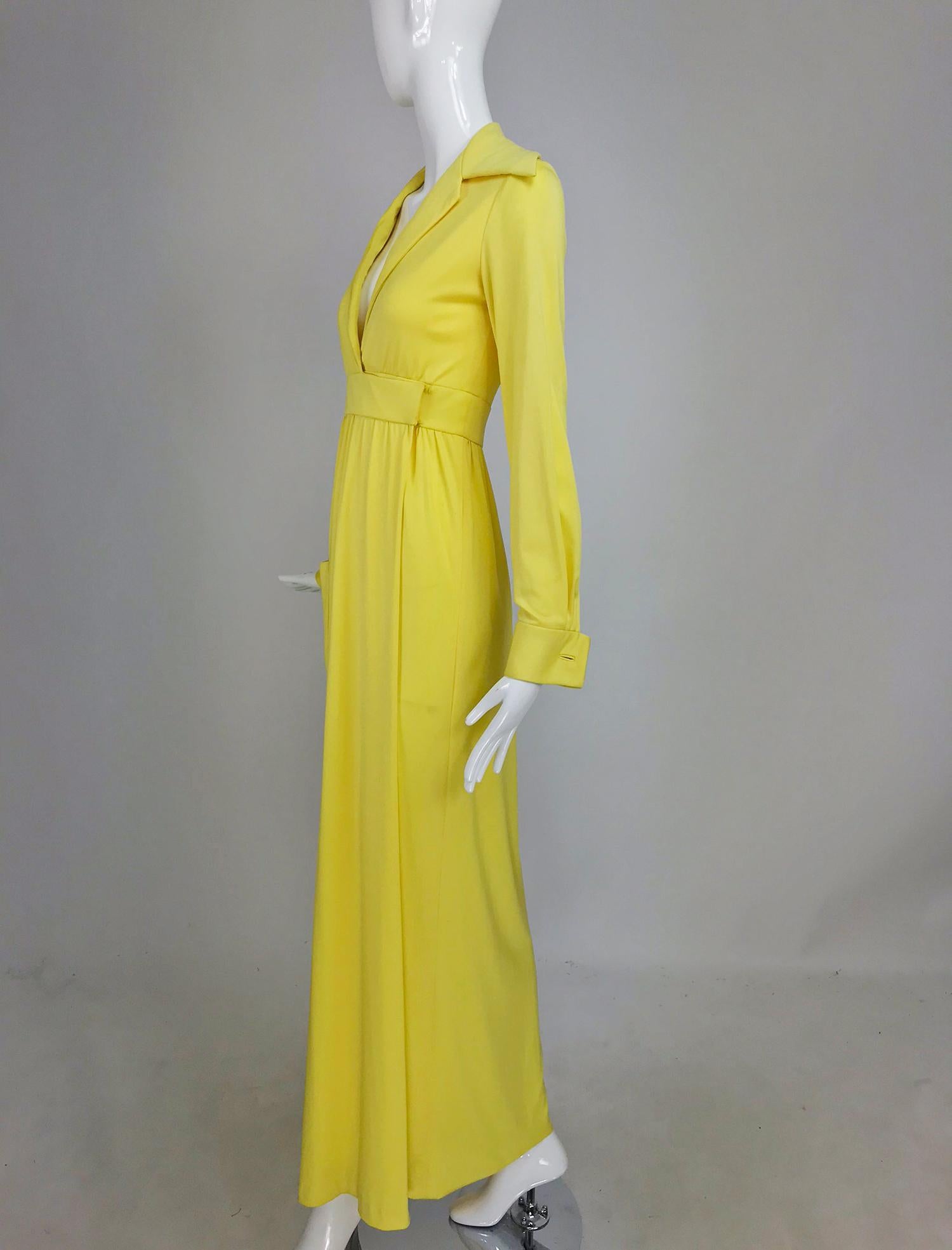 Victoria Royal/Lillie Rubin yellow jersey plunge wrap maxi dress from the 1970s. This dress was made by Victoria Royal Hong Kong and retailed at Lillie Rubin. Sunny yellow silky knit jersey wrap dress. Plunge neckline with a wide lapel collar, long