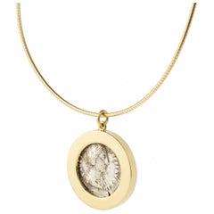Victoria Strigini: Ancient Roman Silver Coin of Faustina, 18k Gold Slice Pendant
