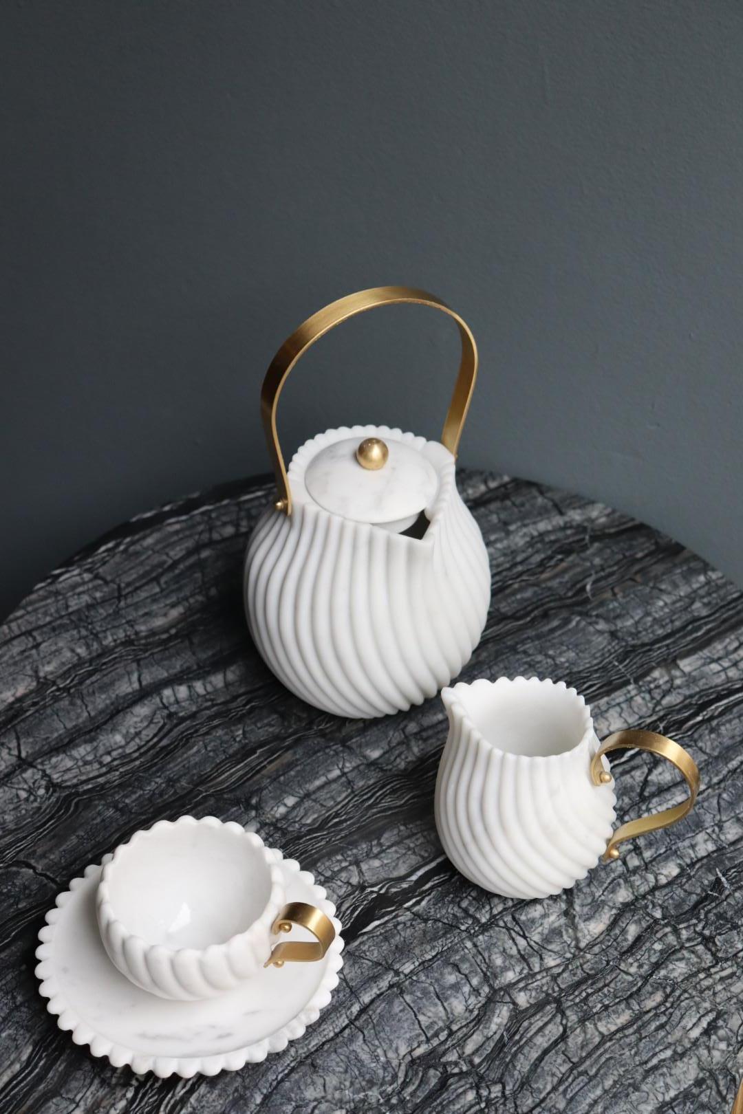 Victoria tea set in marble, design by Bethan Gray, celebrates the ritual of drinking tea, merging a Classic British tradition with a Classic Italian material – marble. It takes inspiration from the traditional tea sets found at the V&A ceramics