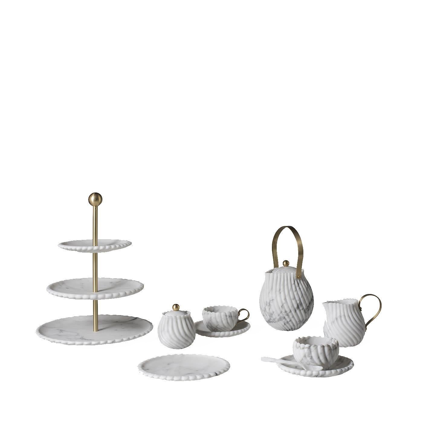 Part of the Victoria collection that celebrates the ritual of enjoying tea in the afternoon, this piece reinterprets the iconic teapot luxuriously and sumptuously, crafting a handmade marble piece that will make a sophisticated statement on any