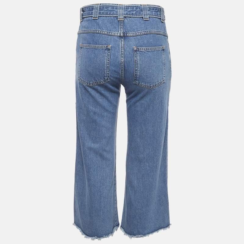 Questi jeans di Victoria Victoria Beckham sono un must have essenziale del guardaroba. Questi jeans cropped blu possono essere indossati sia alti che bassi per ottenere look casual e comodi o chic e alla moda.