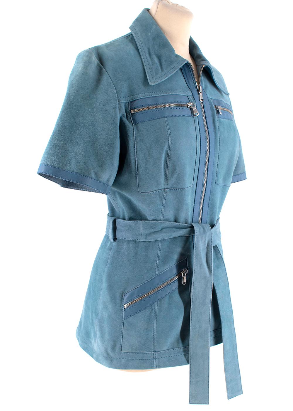 Victoria Victoria Beckham Blue Suede Leather Shirt 

- Belted leather short sleeves shirt in light blue colour 
- Multi pockets at front 
- Zip fastening at front 
- Classic neckline with a collar 

Materials:
100% Suede trim: 100% lamb