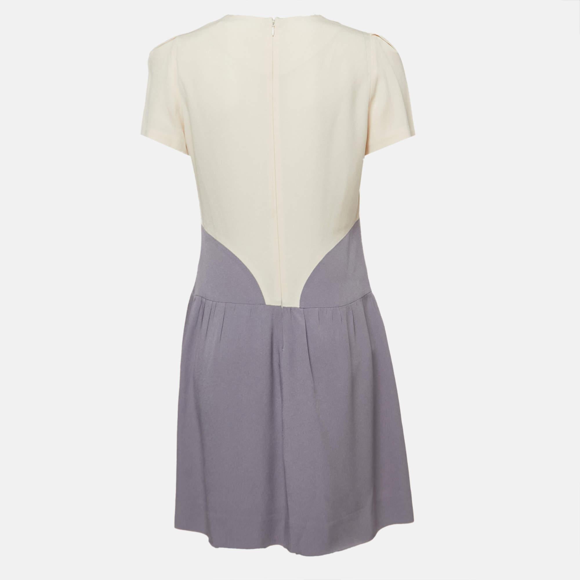 This well made designer dress is a celebration of classic design and enduring style. Meticulous attention to detail and premium materials ensure comfort and a flattering silhouette. Its classic design transcends fashion trends becoming a wardrobe