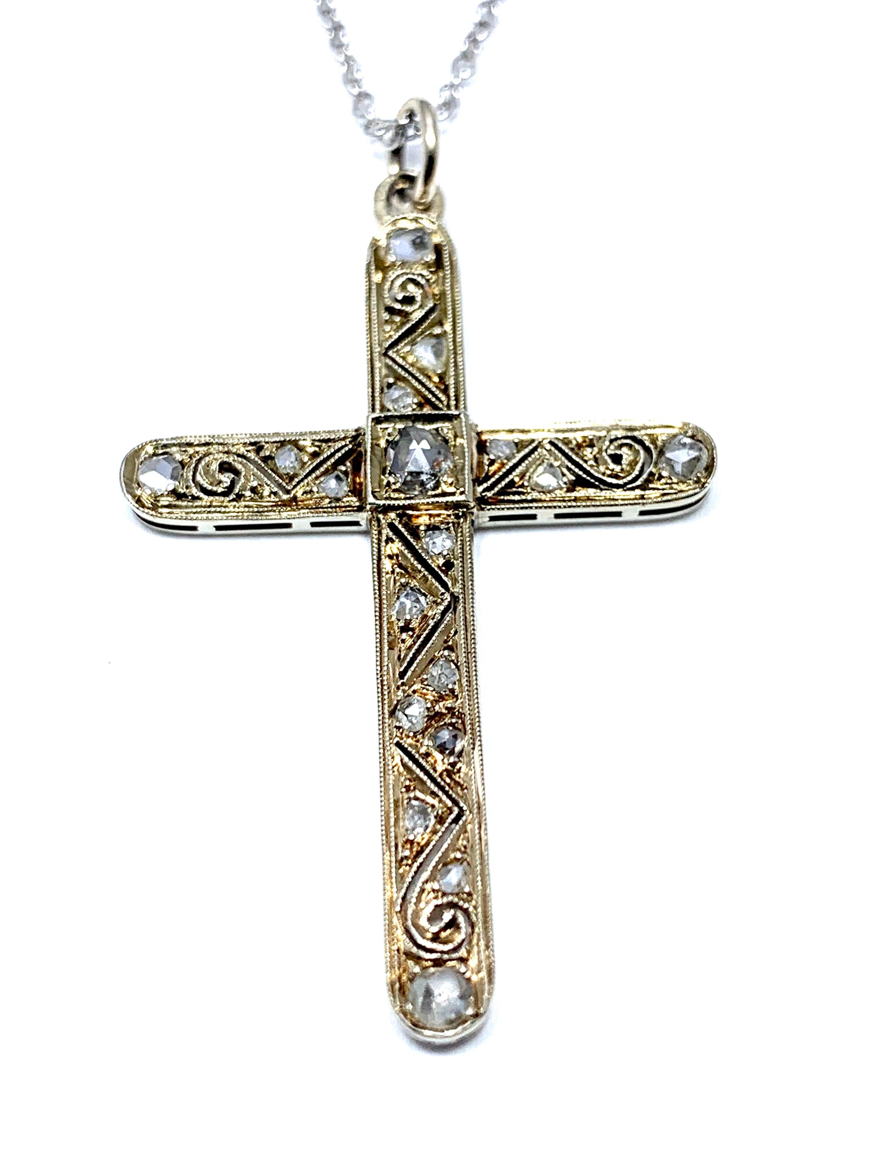 A gorgeous Victorian 0.25 carat Russian cross.  The handcrafted cross has 18 Diamonds in total set in 14 karat white gold.  The details of the work is done to perfection.  The cross measures 1.50 x 1.00 inch.  Offered by Charles Schwartz & Son