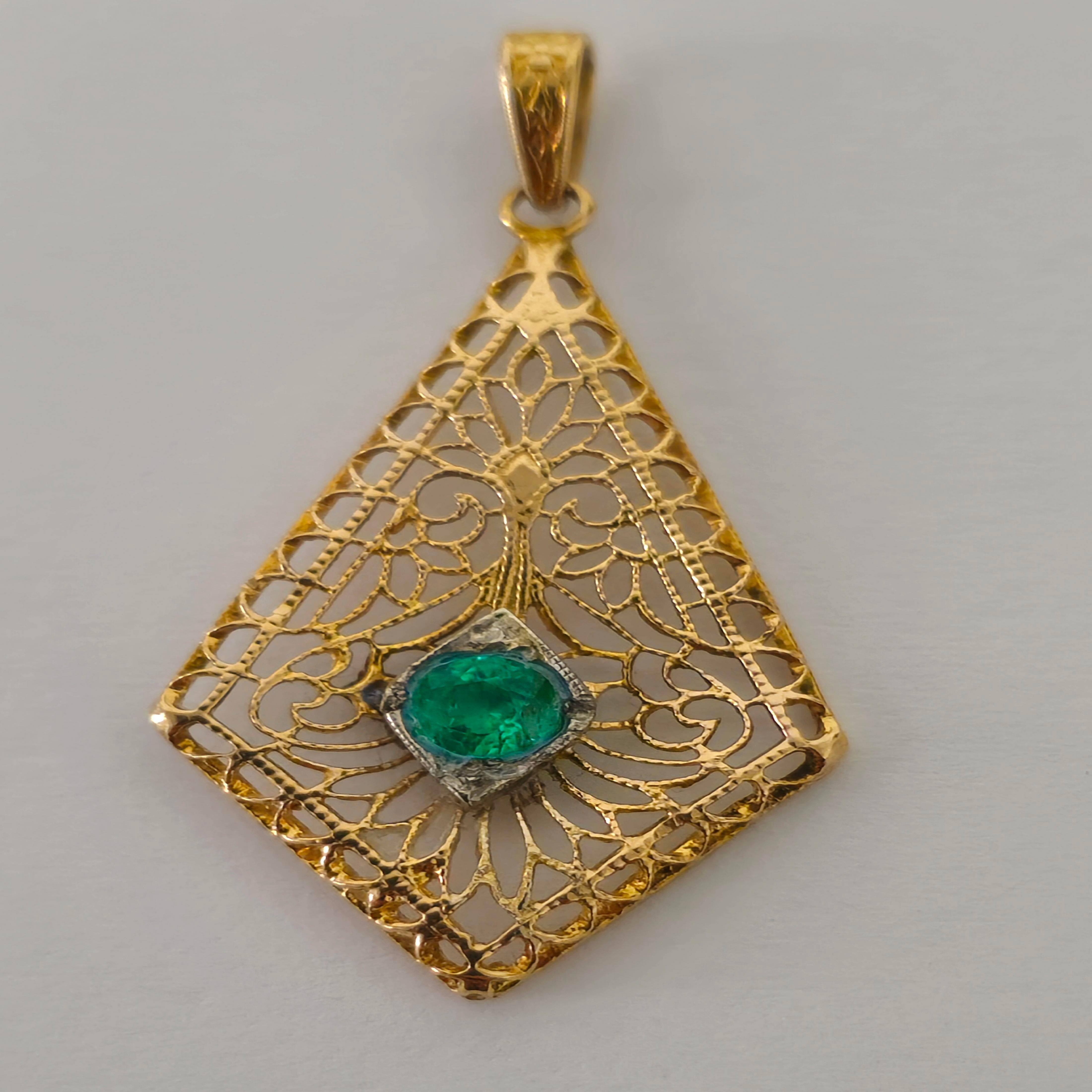 Discover timeless elegance with our Victorian Fine Jewelry Emerald Pendant, crafted from radiant 14k yellow gold. Adorned with a stunning 0.32 carat round-shaped emerald, this pendant exudes natural beauty and sophistication. Perfect for her, it's a