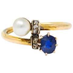 Antique Victorian 0.46 Carat Sapphire Pearl Diamond 18 Karat Gold Bypass Ring