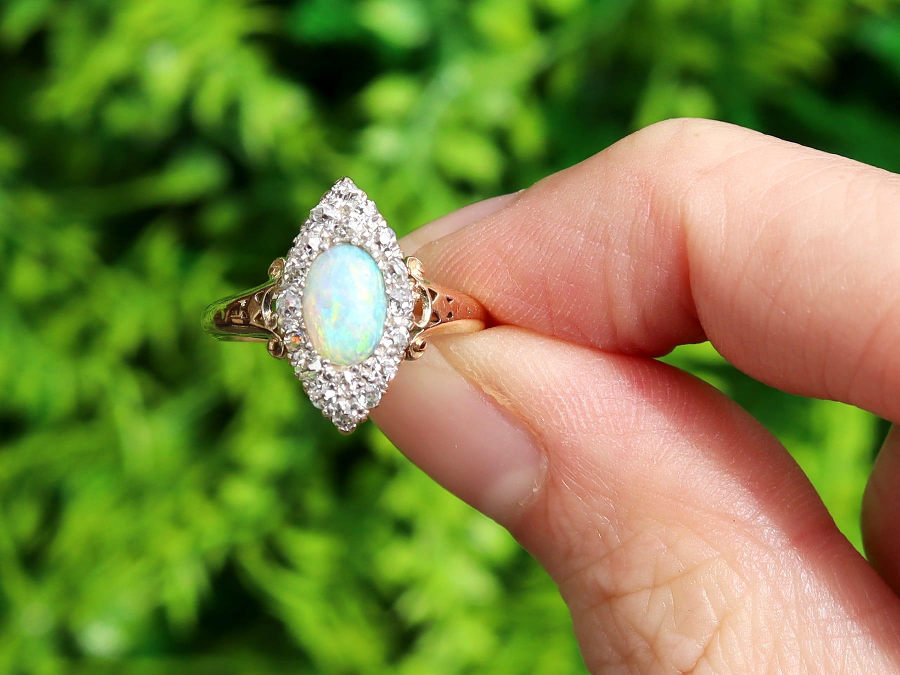 A fine and impressive antique 0.50 carat opal and 0.33 carat diamond, 18 karat yellow gold dress ring; part of our diverse collection of Victorian jewellery

This fine and impressive antique opal ring has been crafted in 18k yellow gold with a