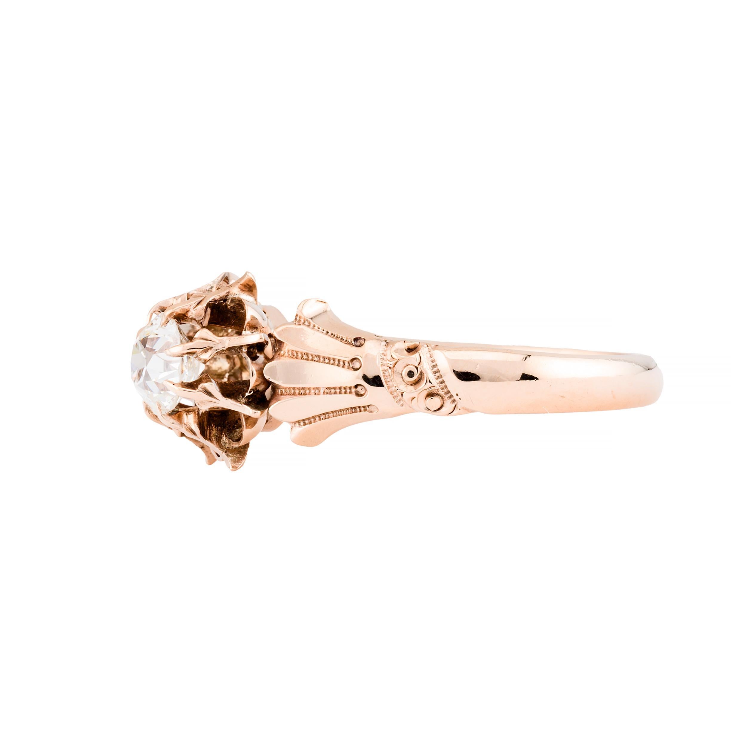 Aston Estate Jewelry Presents:

A Victorian engagement ring featuring an old mine cut diamond.

The central diamond weighs 0.51 carats and is white in color.

Set in an intricate floral motif with detailed prongs.

Crafted in 14k gold with ornate