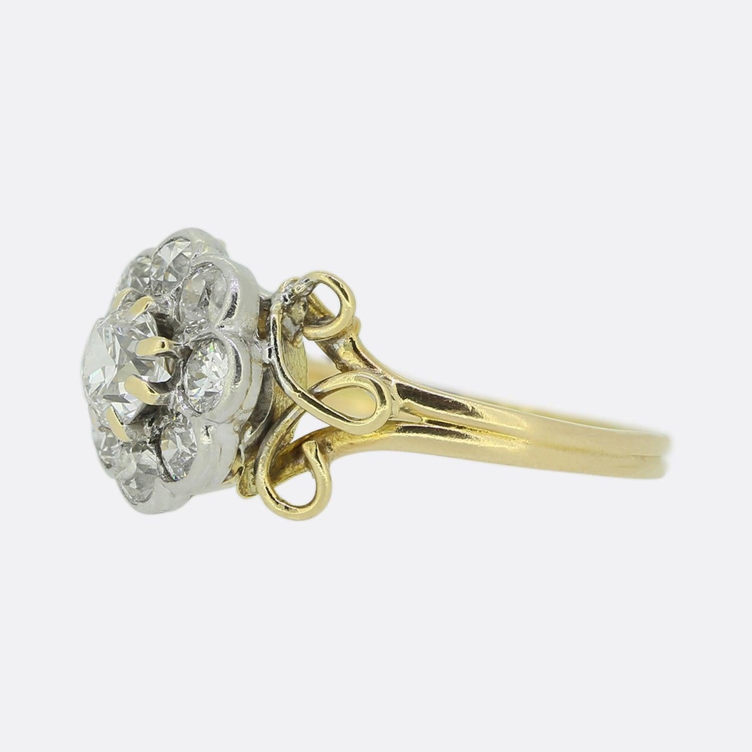 Here we a wonderful Victorian diamond cluster ring. The ring features a central old cut diamond which is surrounded by a halo of eight old cut diamonds in a cluster formation and crafted in 18ct yellow gold. 

Condition: Used (Very Good)
Weight: 2.0