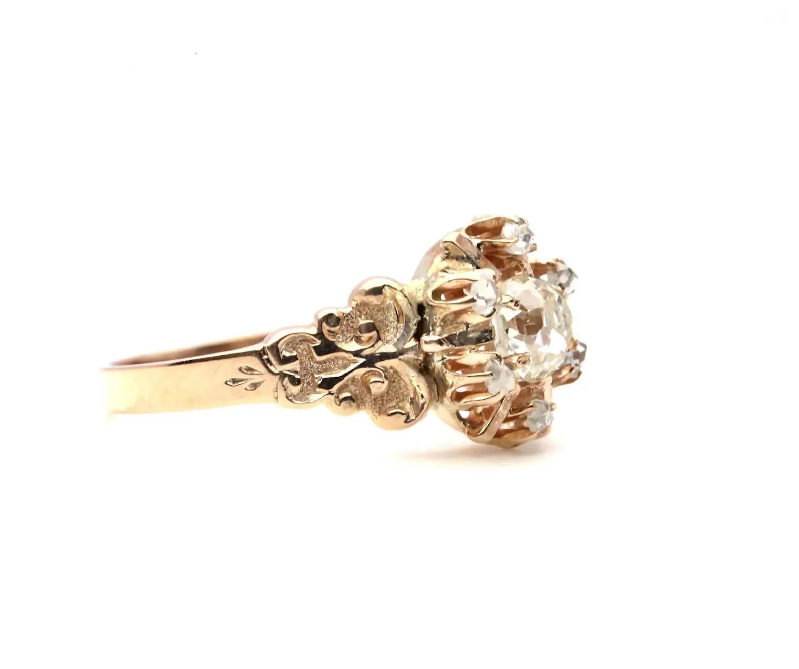 Victorian 0.72ctw Old Mine Cut Diamond Cluster Engagement Ring in 14K Gold In Good Condition For Sale In Boston, MA