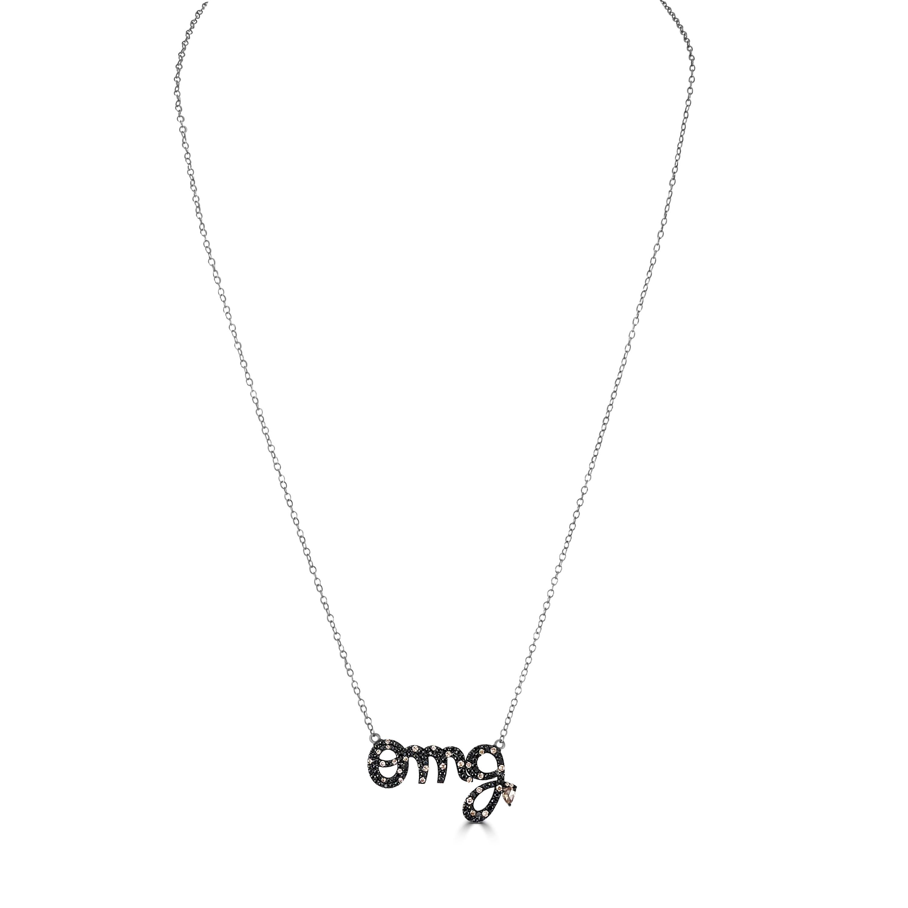 Wir präsentieren unseren viktorianischen 0.76 Cttw. Die OMG-Anhänger-Halskette mit schwarzem Spinell und Diamanten ist ein atemberaubender Ausdruck moderner Eleganz und Raffinesse.

Diese mit viel Liebe zum Detail gefertigte Halskette besteht aus