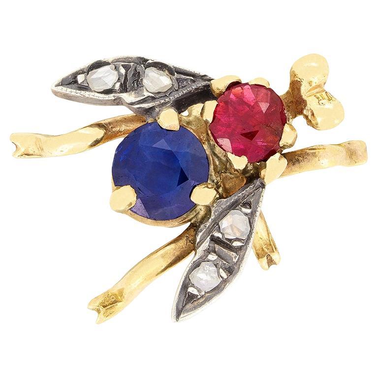 Broche victoriano de zafiro, rubí y diamantes de 0,80 ct, c.1900