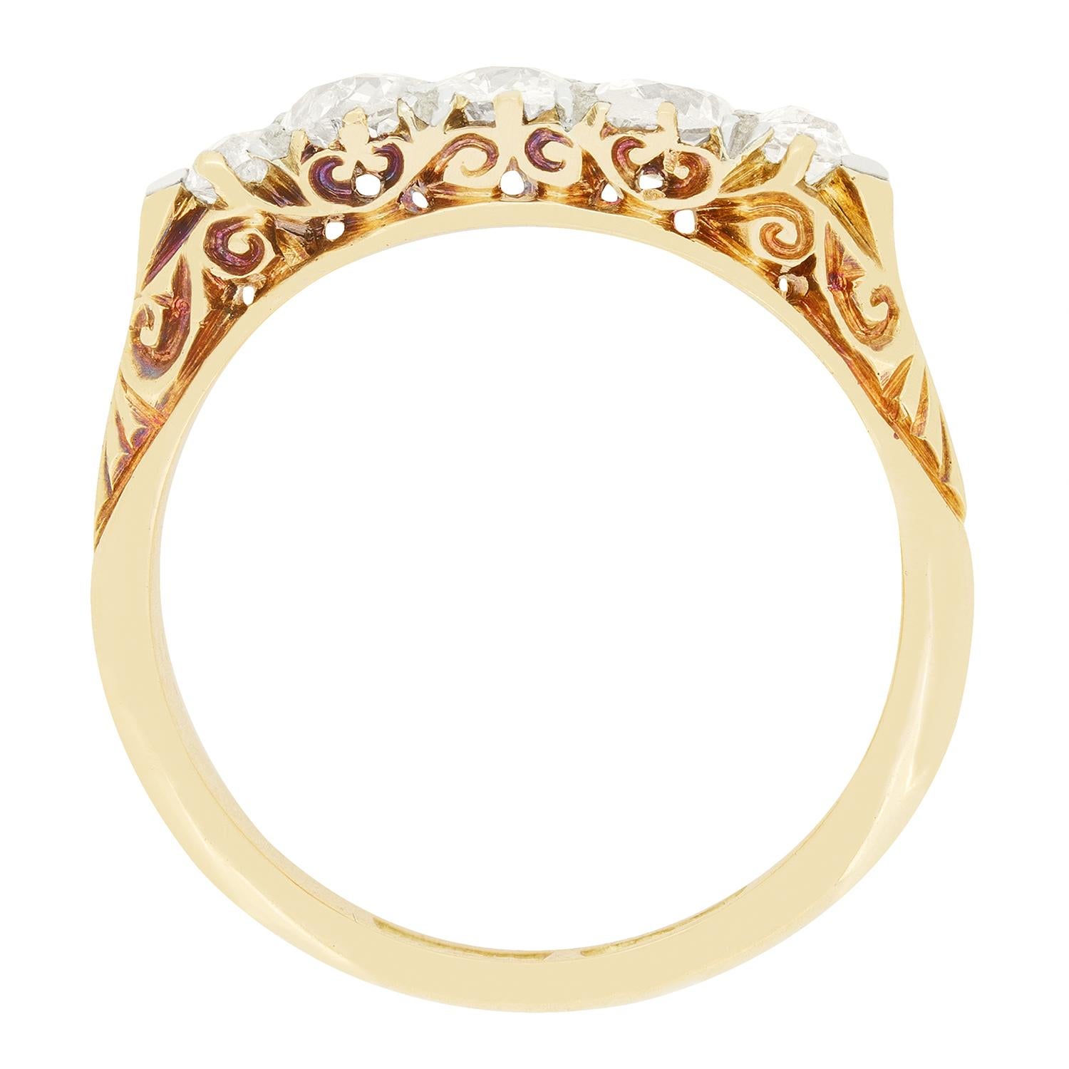 Classically Victorian in its creation, this five stone ring showcases a sparkling collection of old cut diamonds. The central stone weighs 0.25 carat, with two 0.20 carat diamonds flanking and smaller 0.10 carat stones at the ends. Each stone ranges