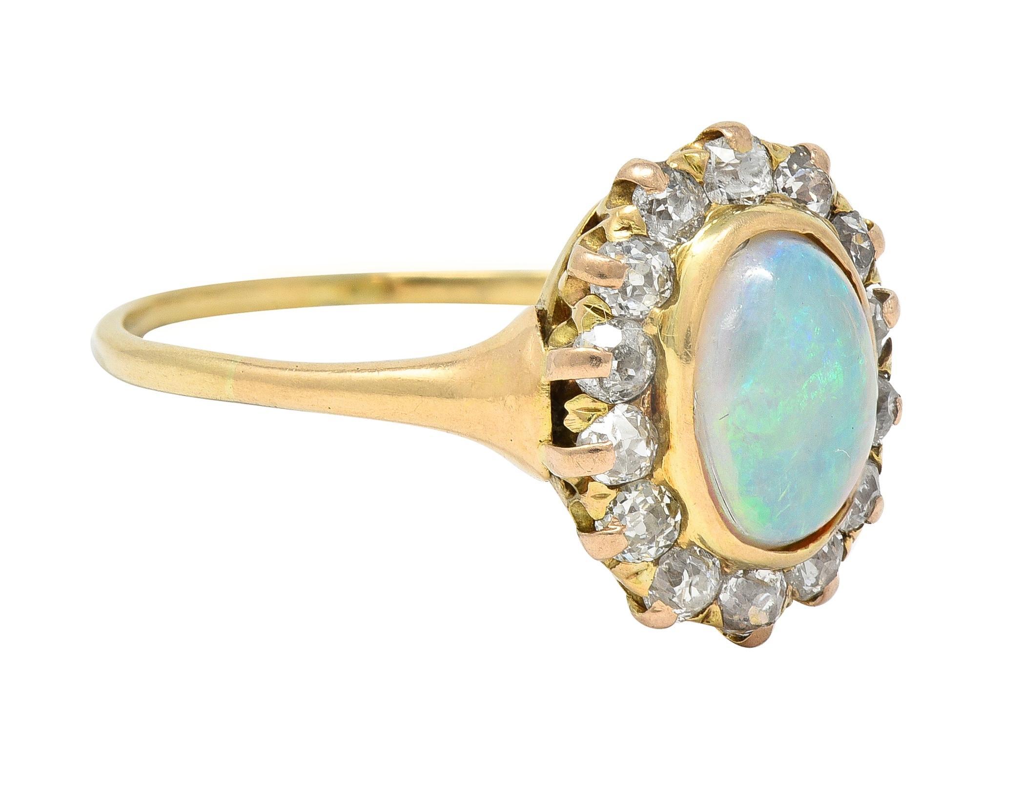 Old Mine Cut Victorian 0.86 CTW Opal Cabochon Diamond 14 Karat Yellow Gold Antique Halo Ring For Sale